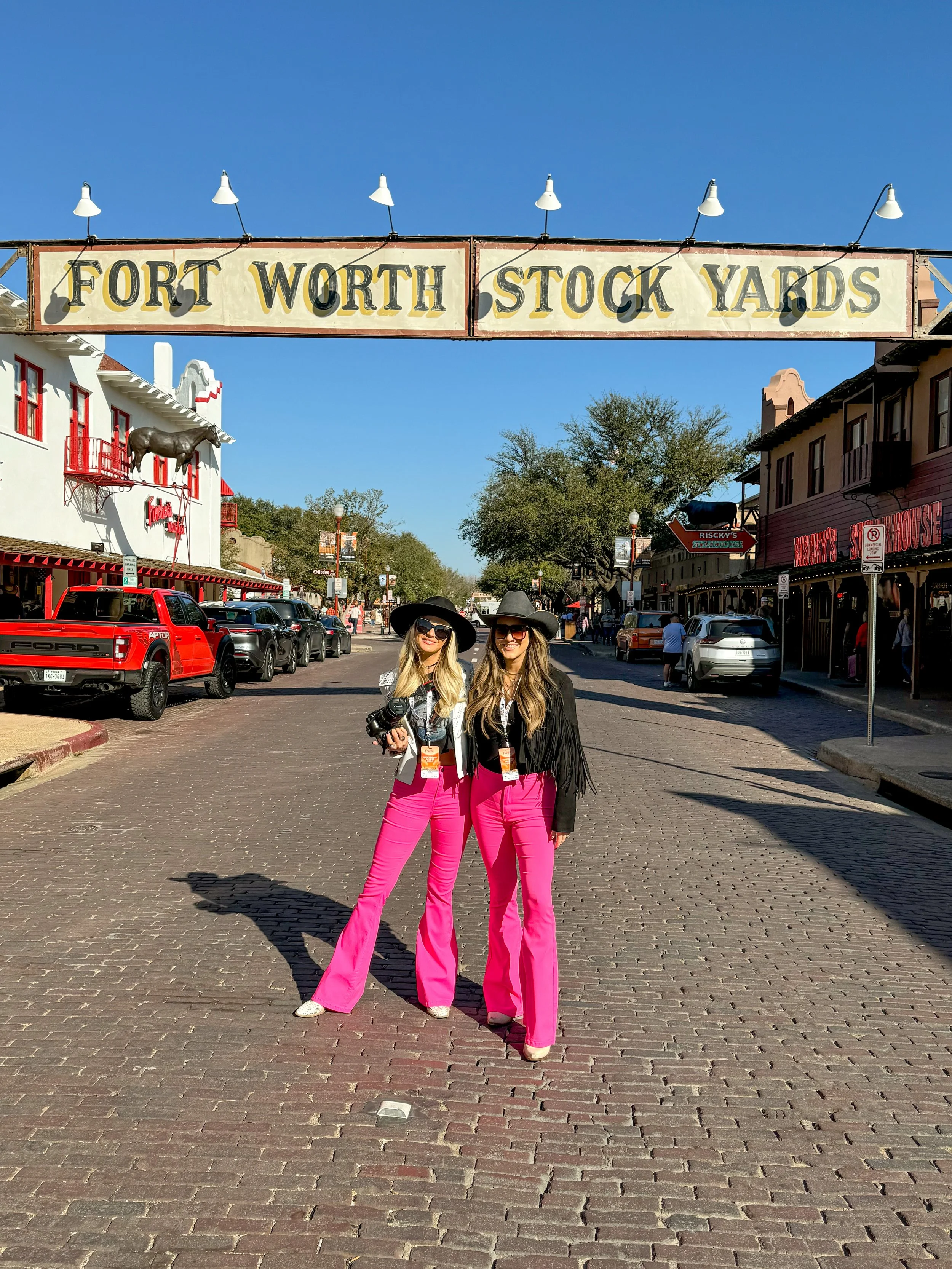 Jenna Danielle Oxford and Karissa Ring representing R5 Entertainment Agency in the Fort Worth Stockyards during the Fort Worth Music Festival, 2024.