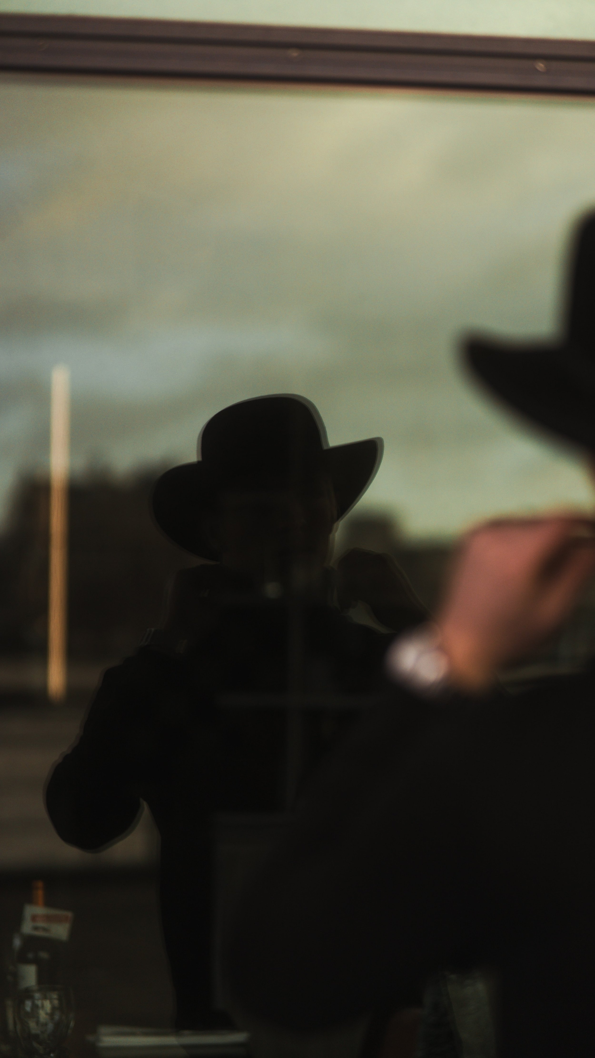 Male in glass reflection.jpg