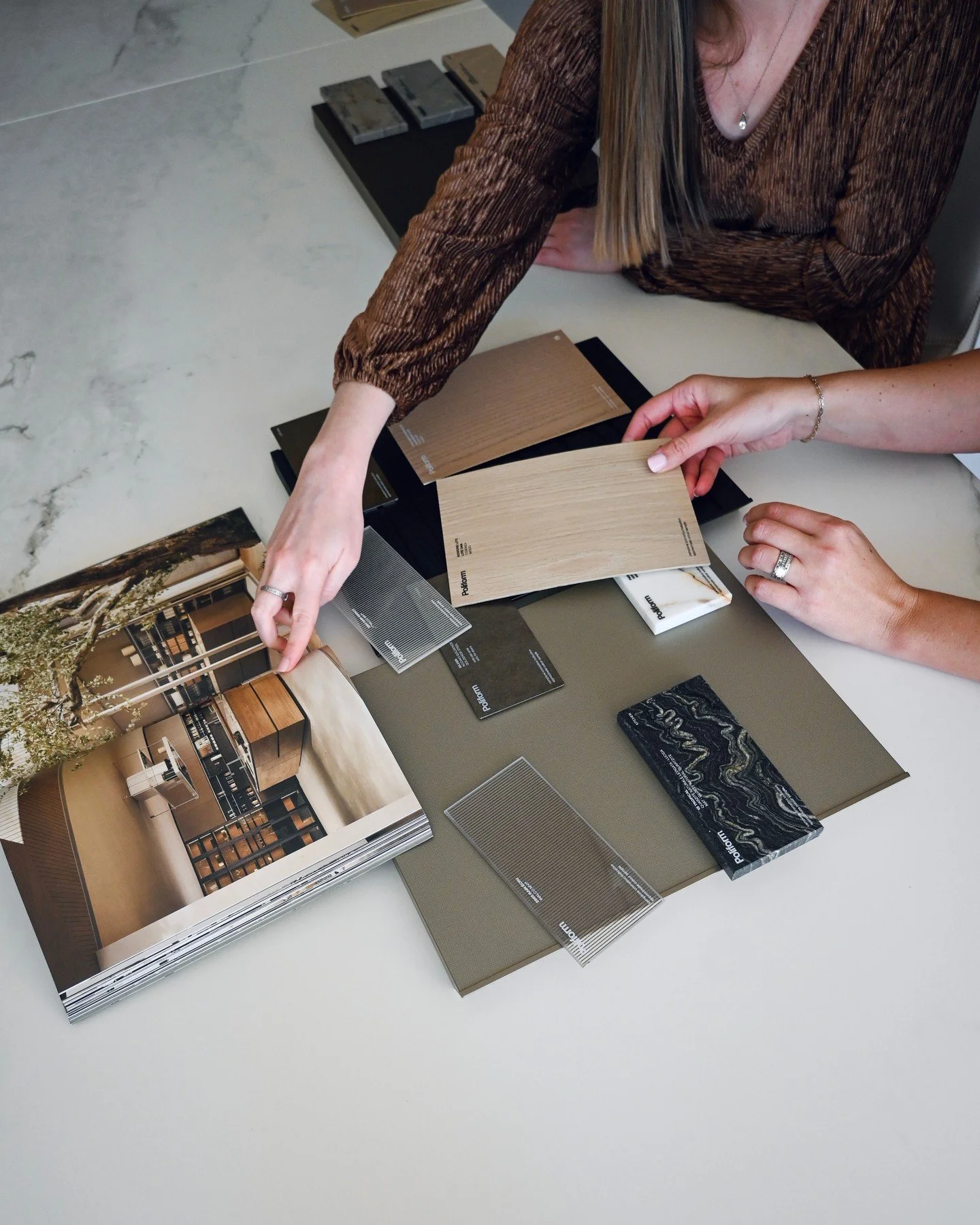 Design decisions are rarely made alone. This moment captures the dialogue between material and guidance&mdash;where touch, texture, and informed perspective come together to shape meaningful choices. By narrowing possibilities and clarifying directio