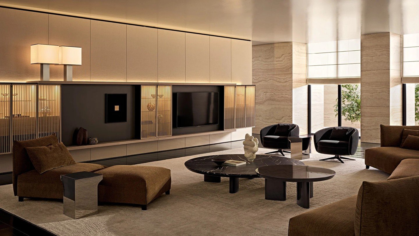 Storage becomes a spatial system with @poliform_official's Code collection. Modular compositions of sideboards, wall units, and freestanding elements adapt to any room, while beveled frame details create shadow lines that articulate each module withi