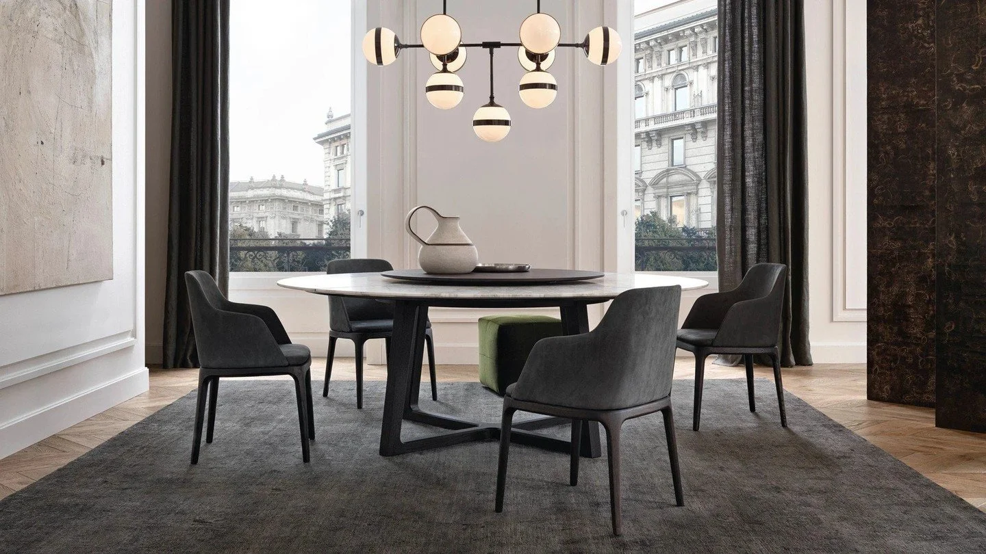 Sculptural. Seductive. Effortlessly commanding attention.

Designed by Emmanuel Gallina for Poliform, the Concorde table is where refined elegance meets architectural precision. Marble or wood tops appear to float above slender metal bases, creating 