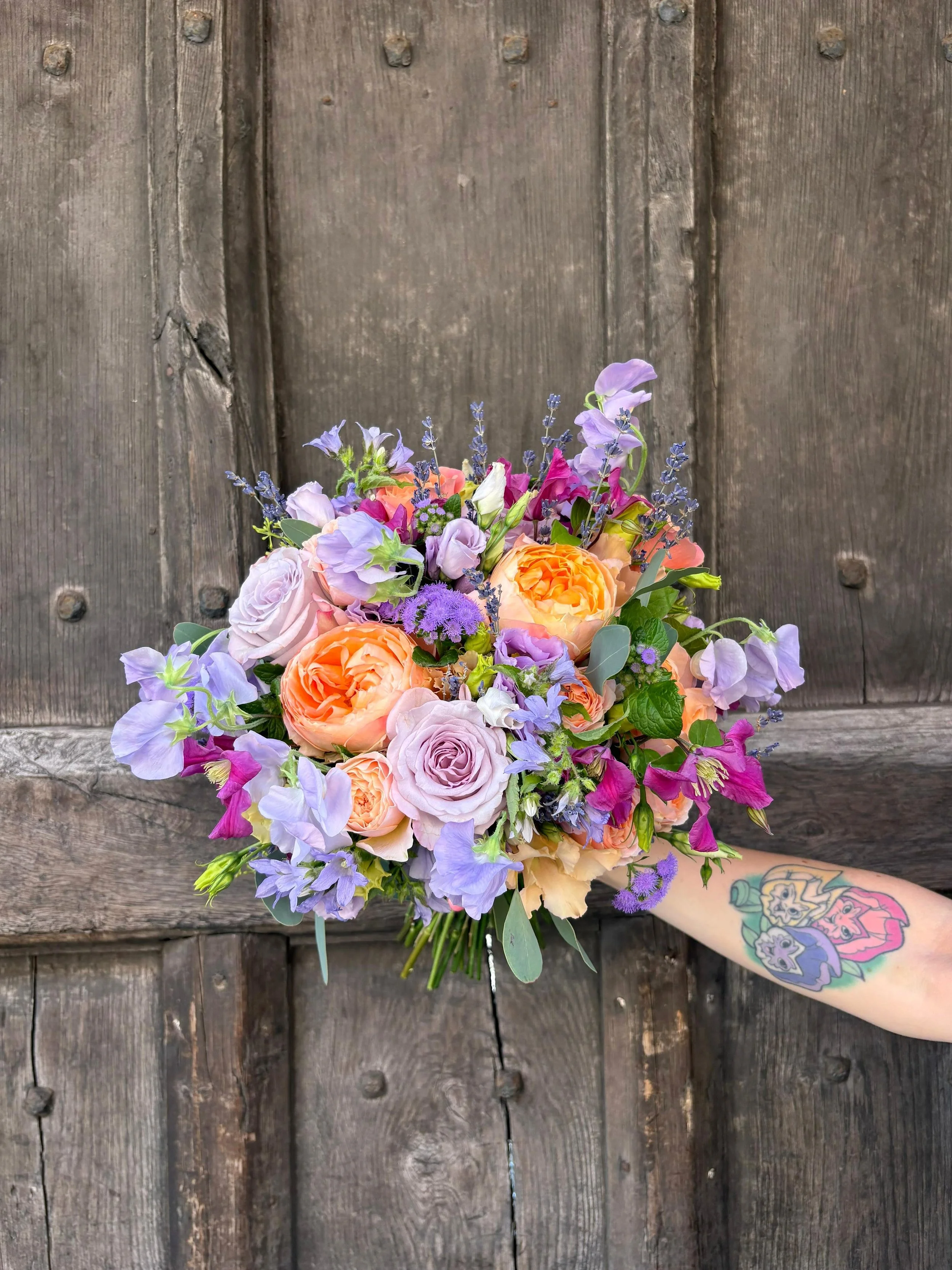 Holly &amp; Will ✨

What a couple! An absolute joy to work with and create these gorgeous florals for their special day. 🧡💜
All us gals at the shop were obsessed with their colour palette of peaches, soft orange and shades of purple. Such a stunnin