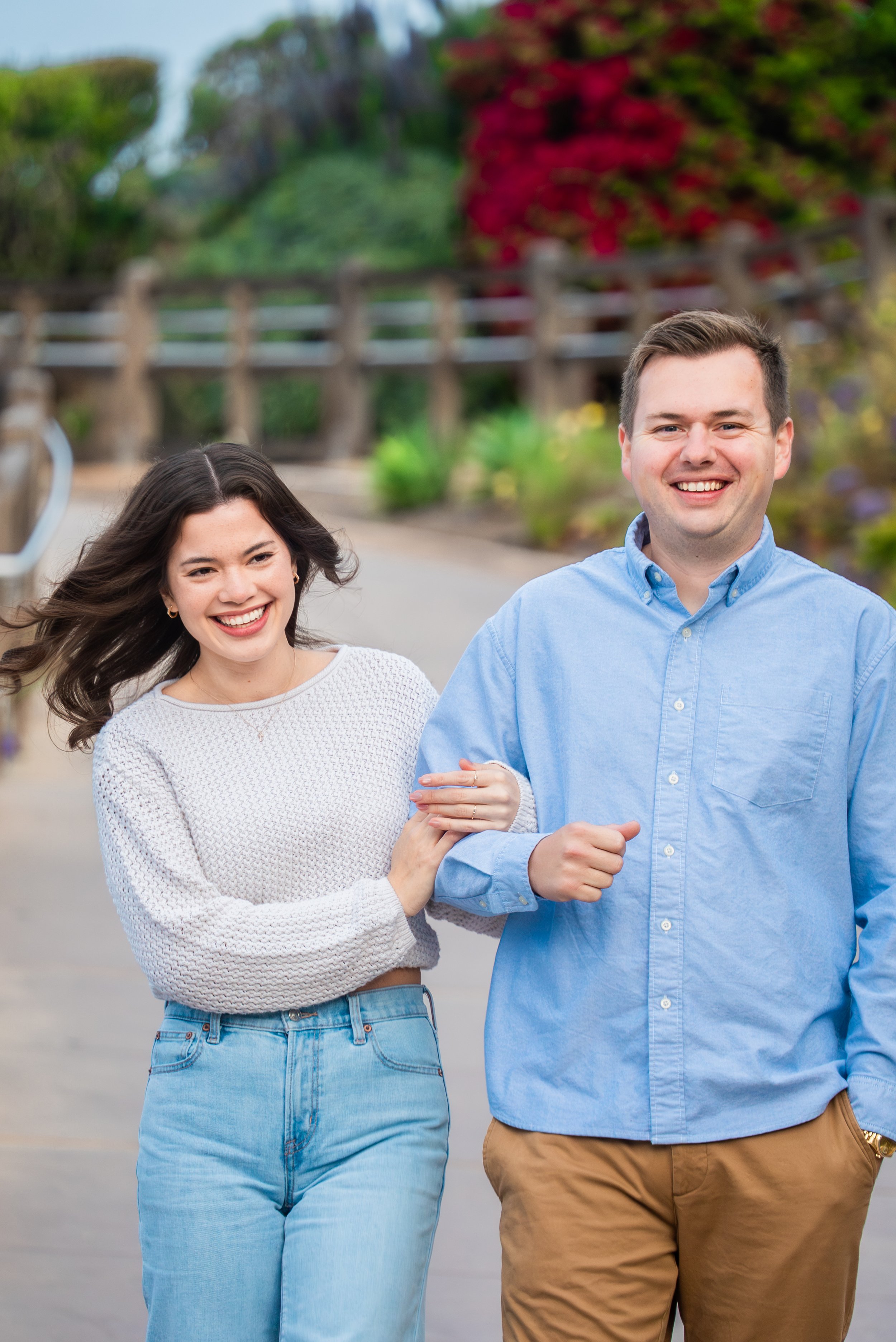laguna-beach-couples-photographer-candid-boardwalk-walk.jpg