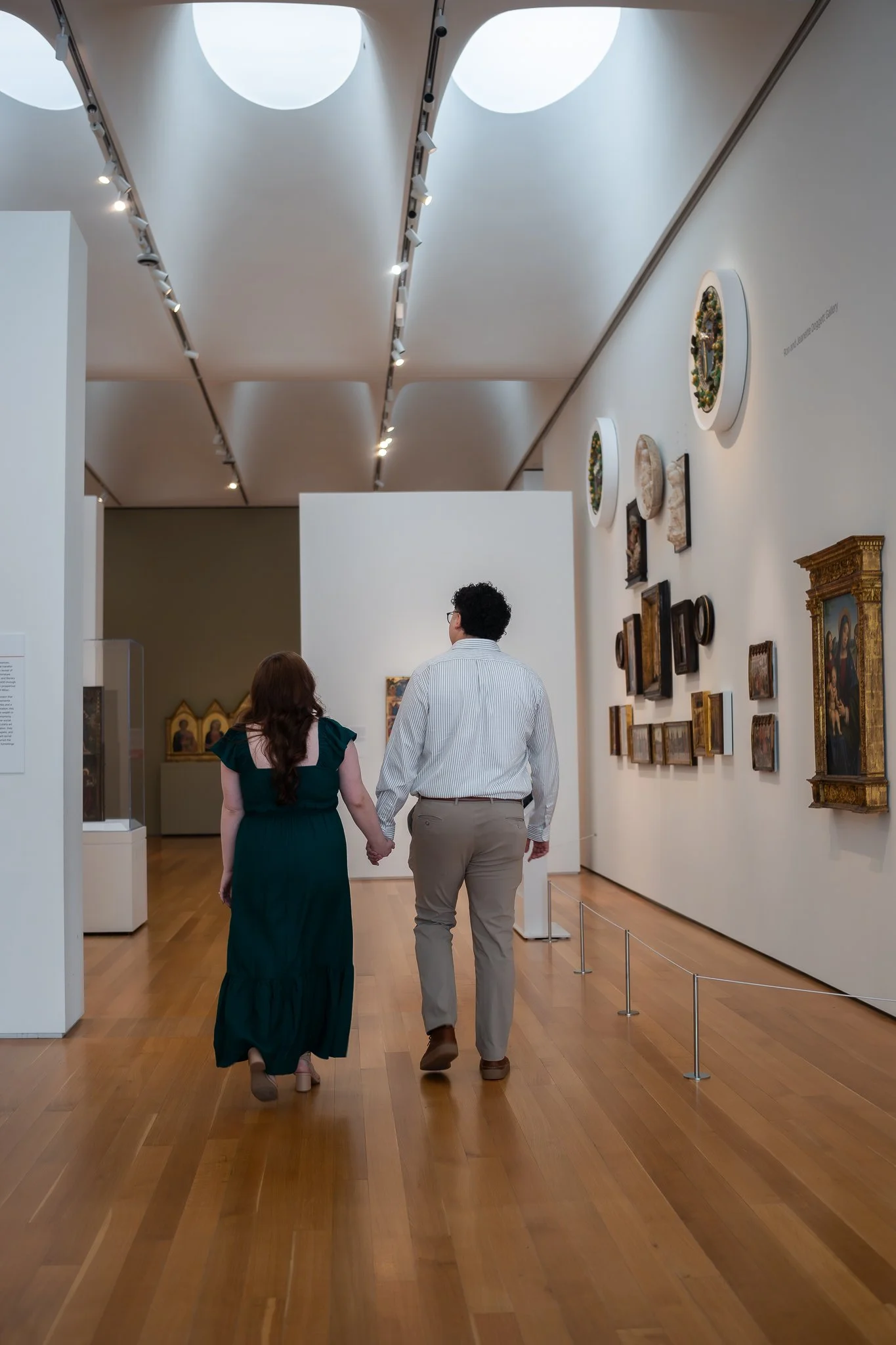 nc-museum-of-art-raleigh-nc-engagement-session-walking-through-gallery.jpg