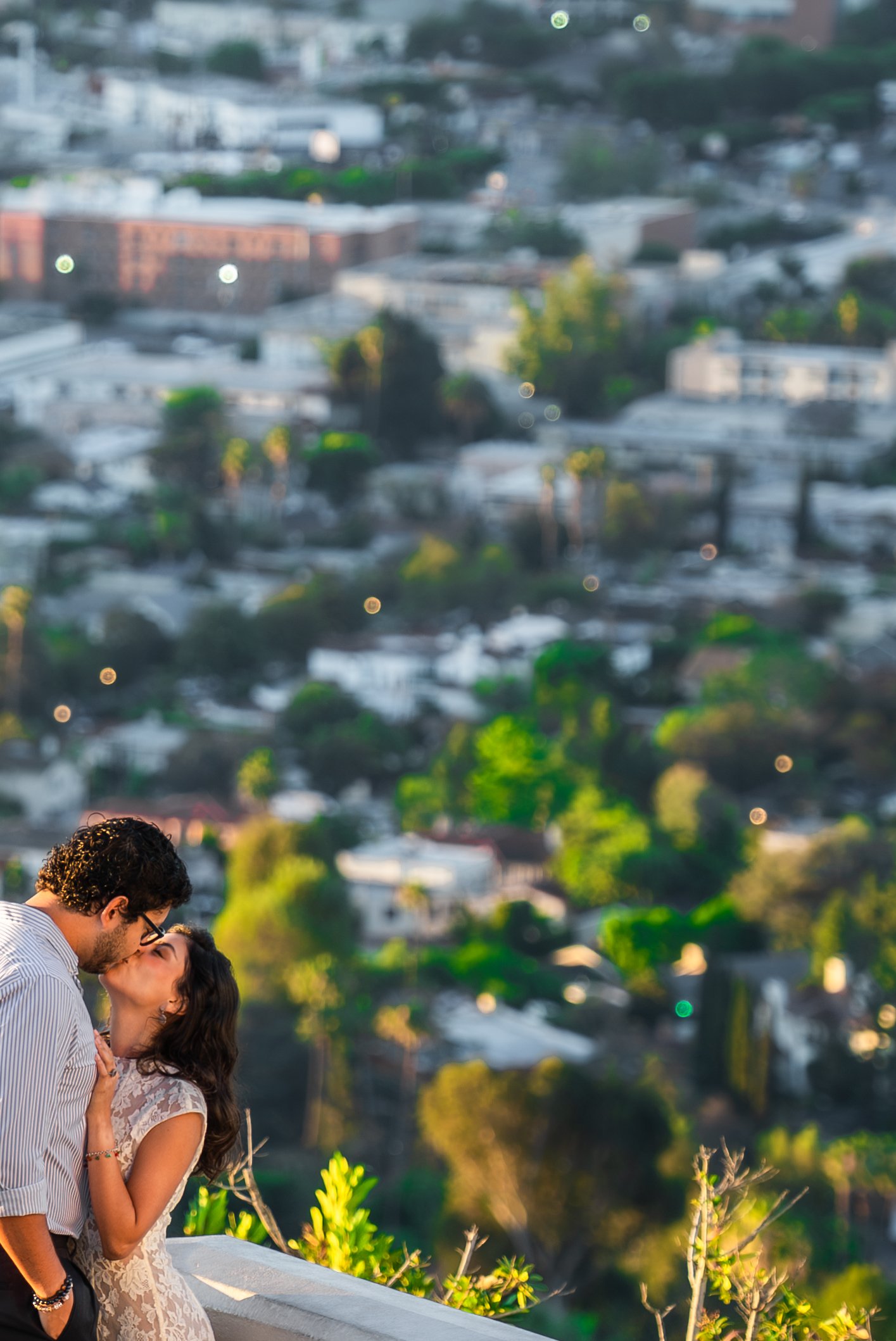 griffith-observatory-los-angeles-couples-session-city-background-kiss.jpg