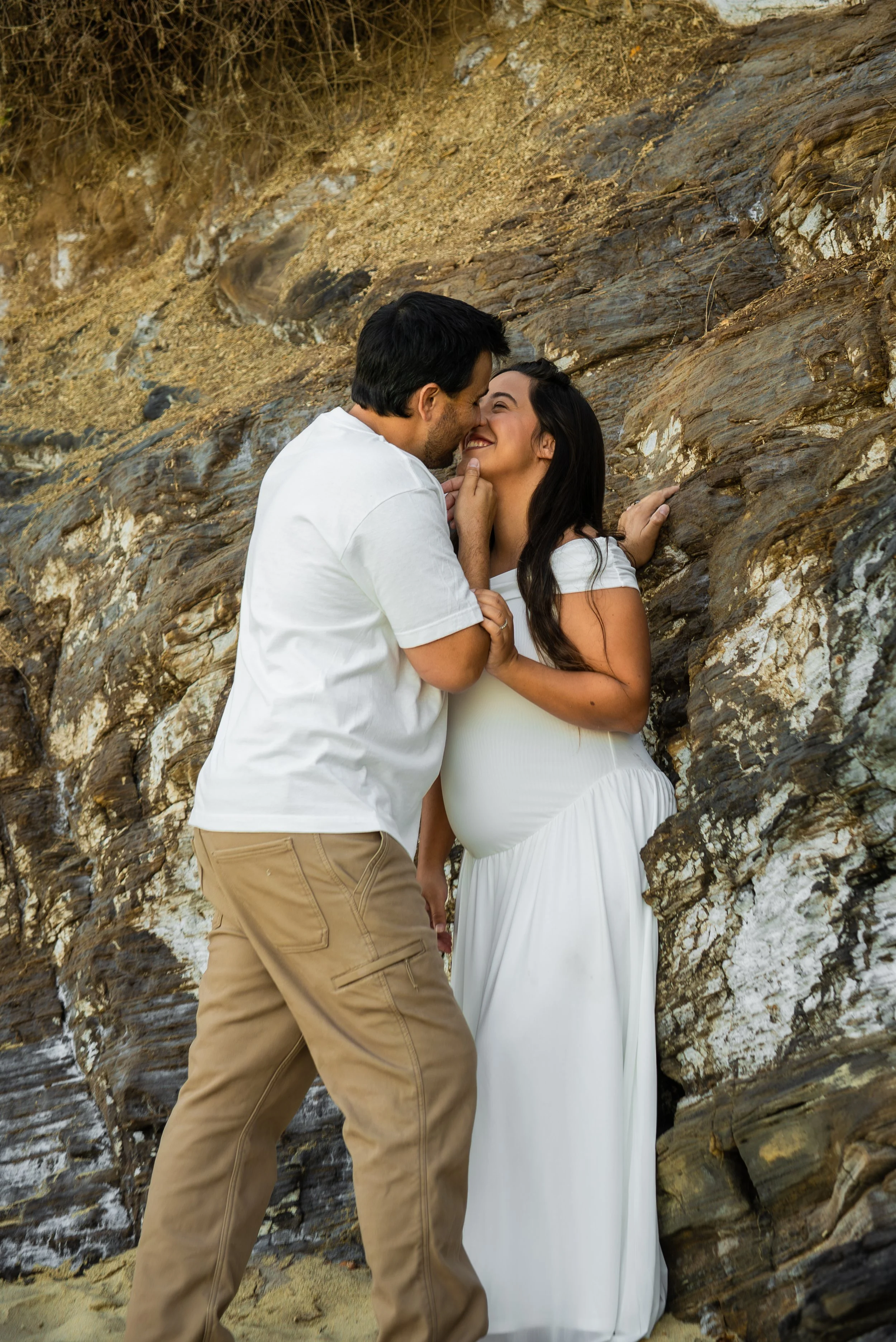 crescent-bay-beach-laguna-beach-ca-maternity-session-rock-wall-embrace.jpg