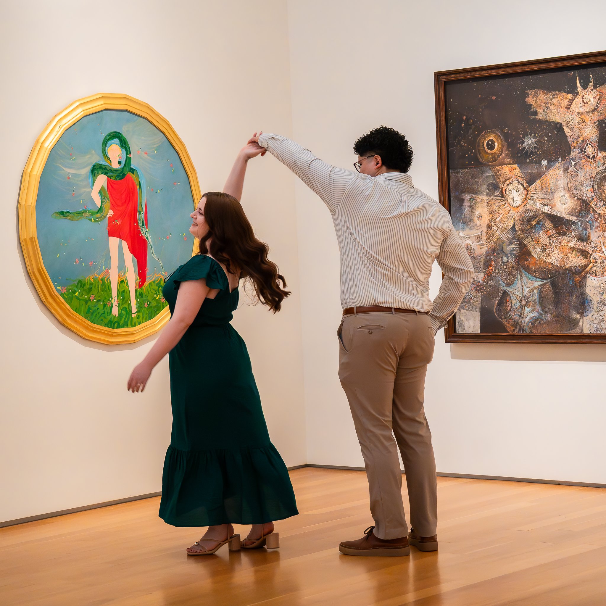 nc-museum-of-art-raleigh-nc-engagement-session-dancing-in-gallery.jpg