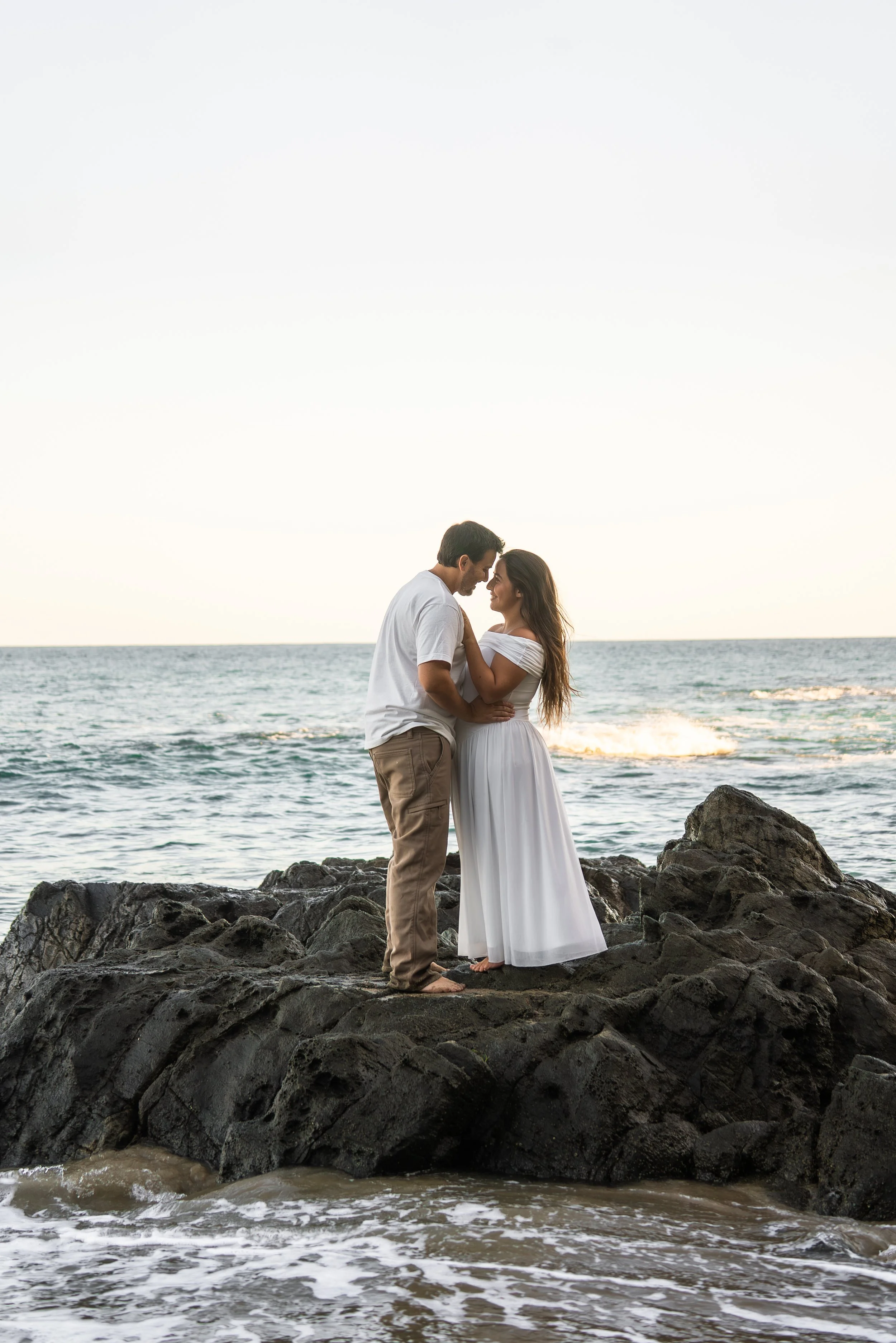 crescent-bay-beach-laguna-beach-ca-maternity-session-rocks-embrace-wide.jpg