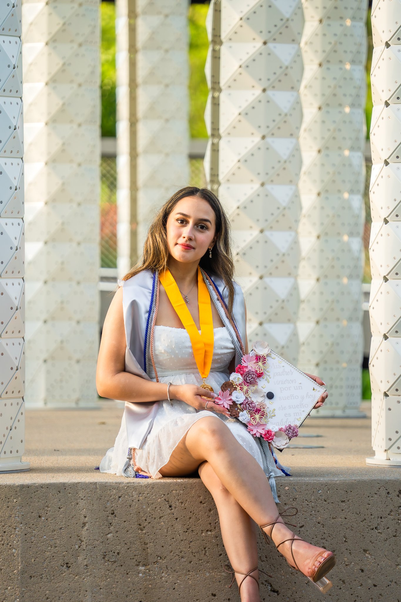 downtown-cary-park-graduation-session-sitting-portrait.jpg