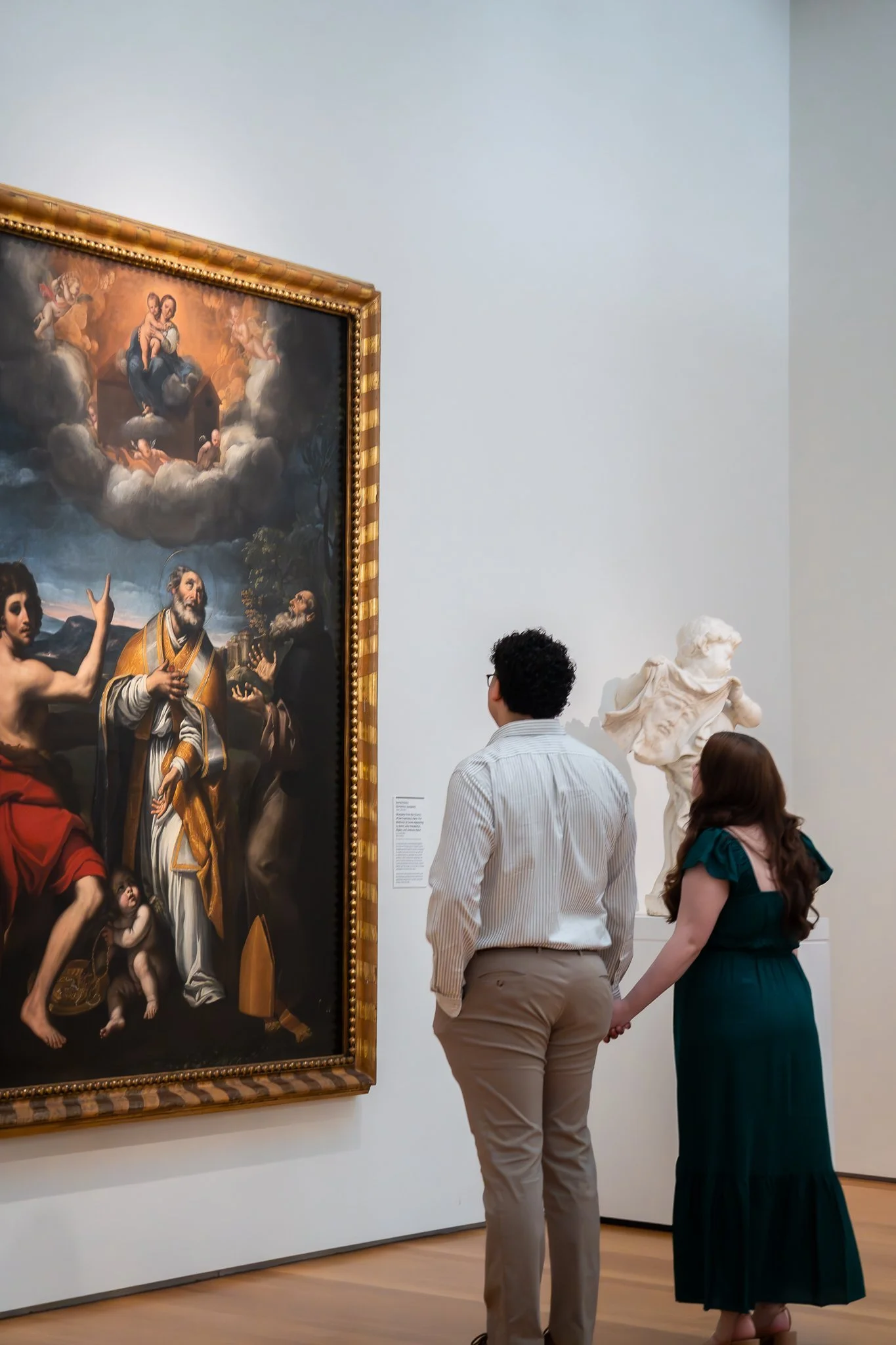 nc-museum-of-art-raleigh-nc-engagement-session-walking-to-artwork.jpg
