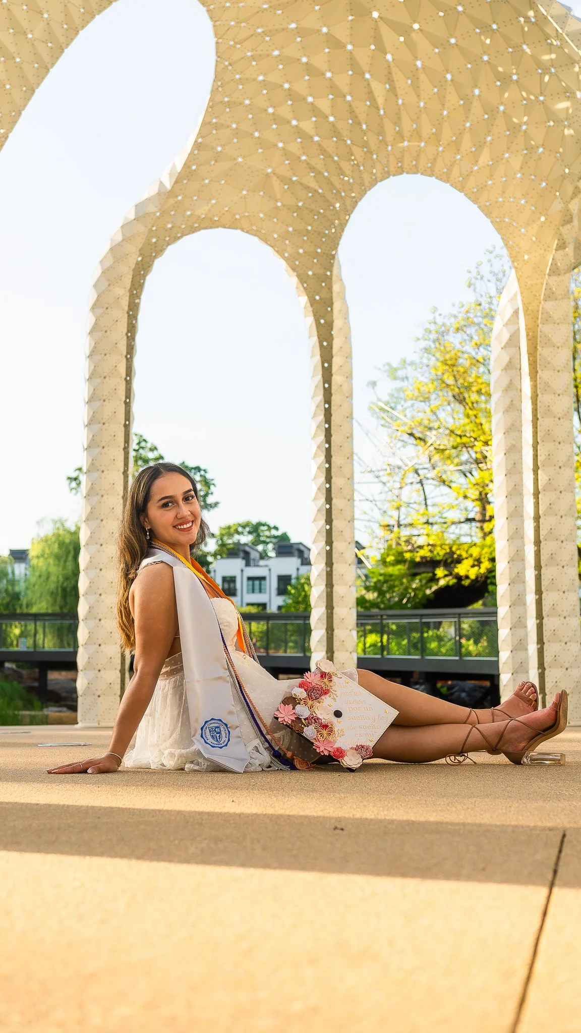 downtown-cary-park-graduation-session-white-arches.jpg