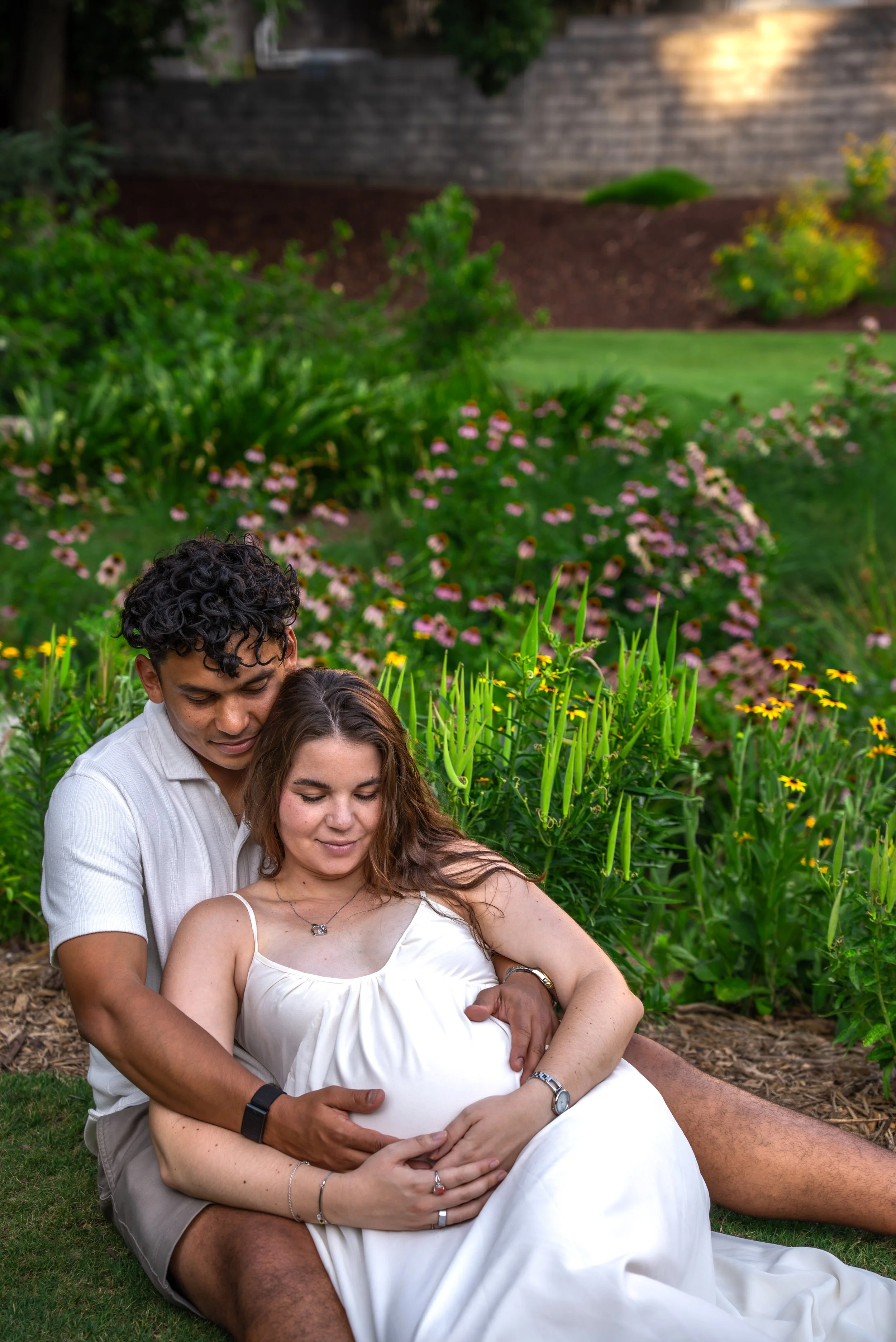 raleigh-rose-garden-raleigh-nc-maternity-session-garden-cuddle.jpg