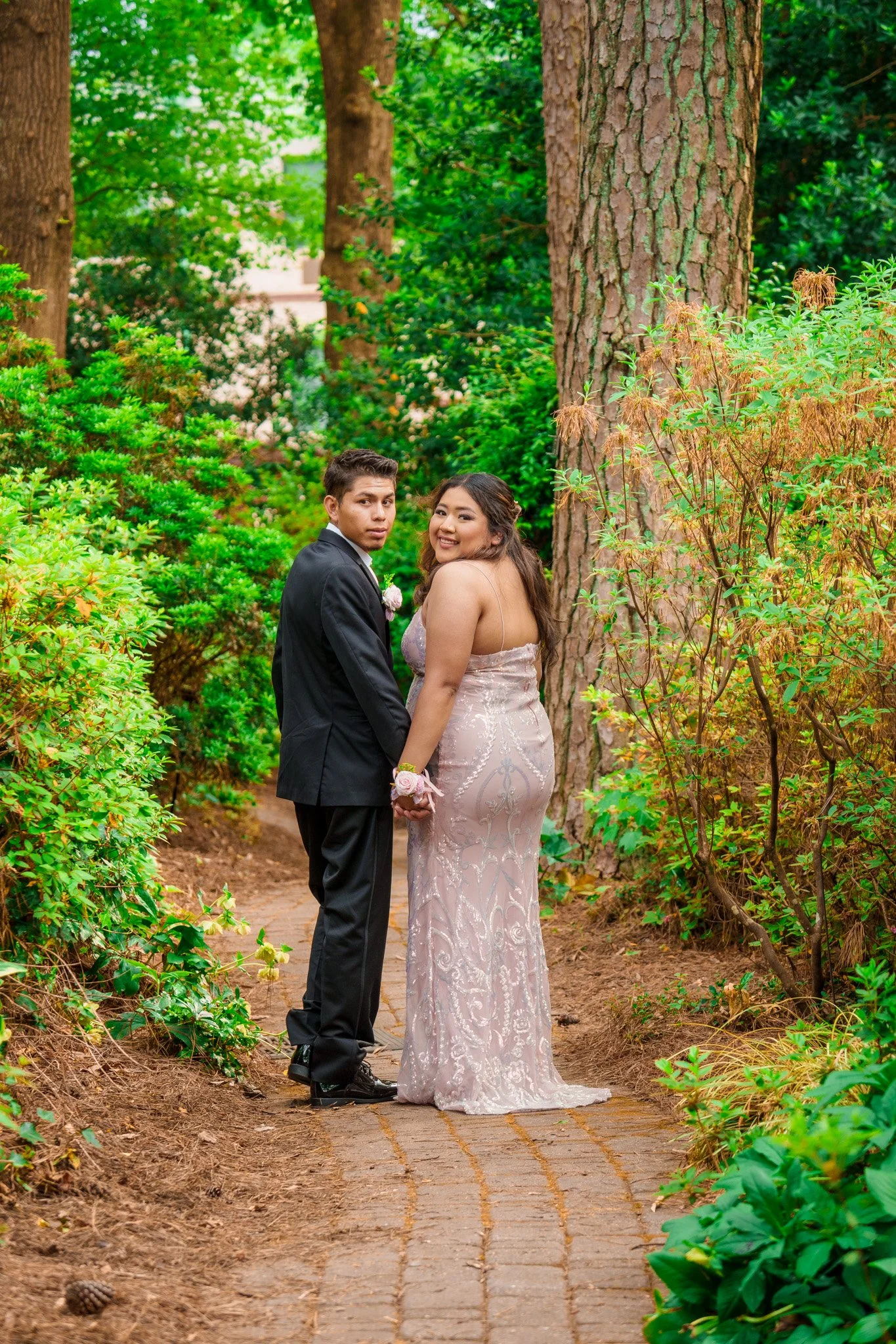 wral-azalea-gardens-raleigh-nc-prom-photography-couple-in-garden-path-kzk-visuals.jpg