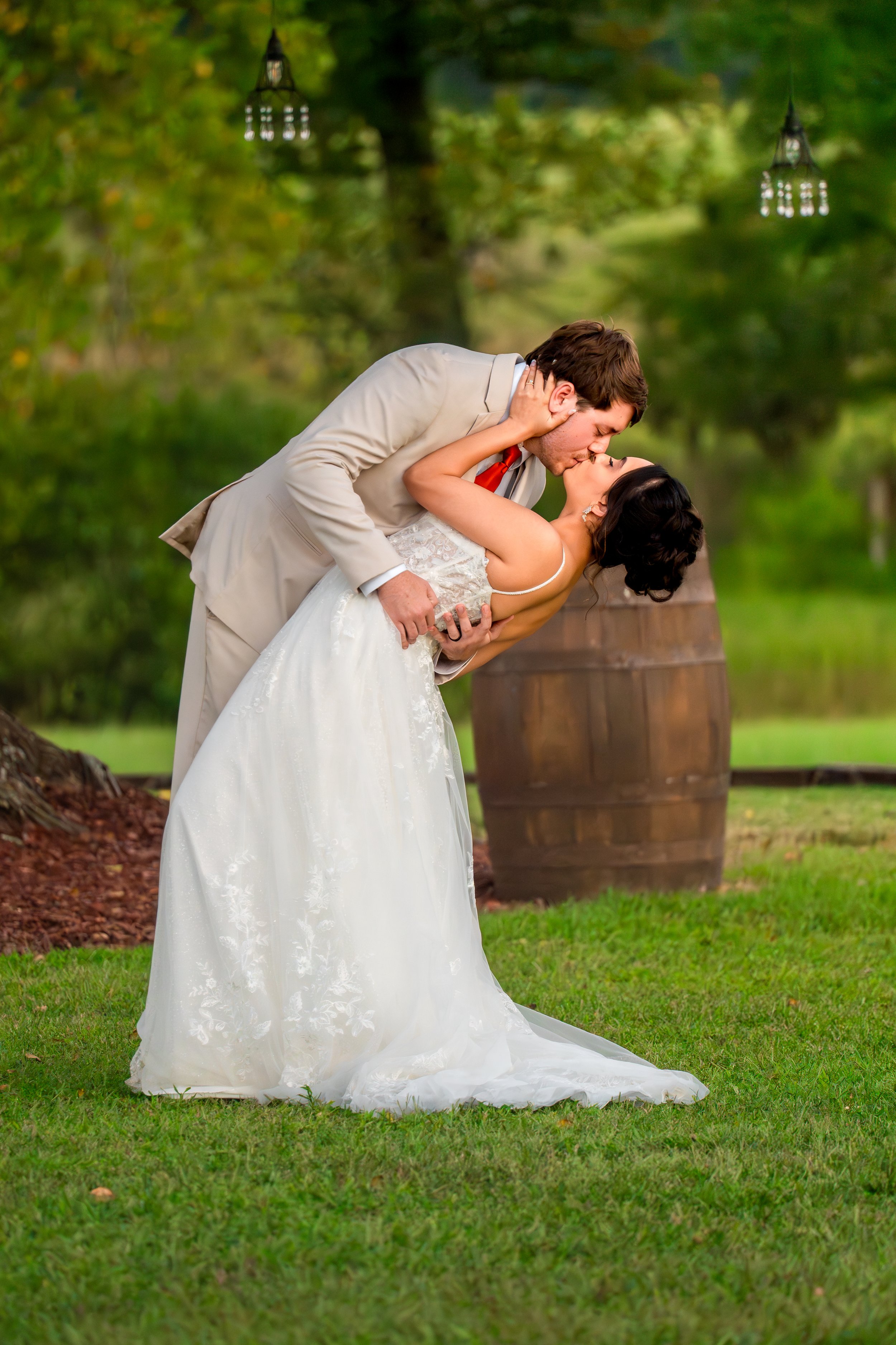 skyler-ben-wedding-couple-dip-kiss-double-c-ranch-coats-nc.jpg