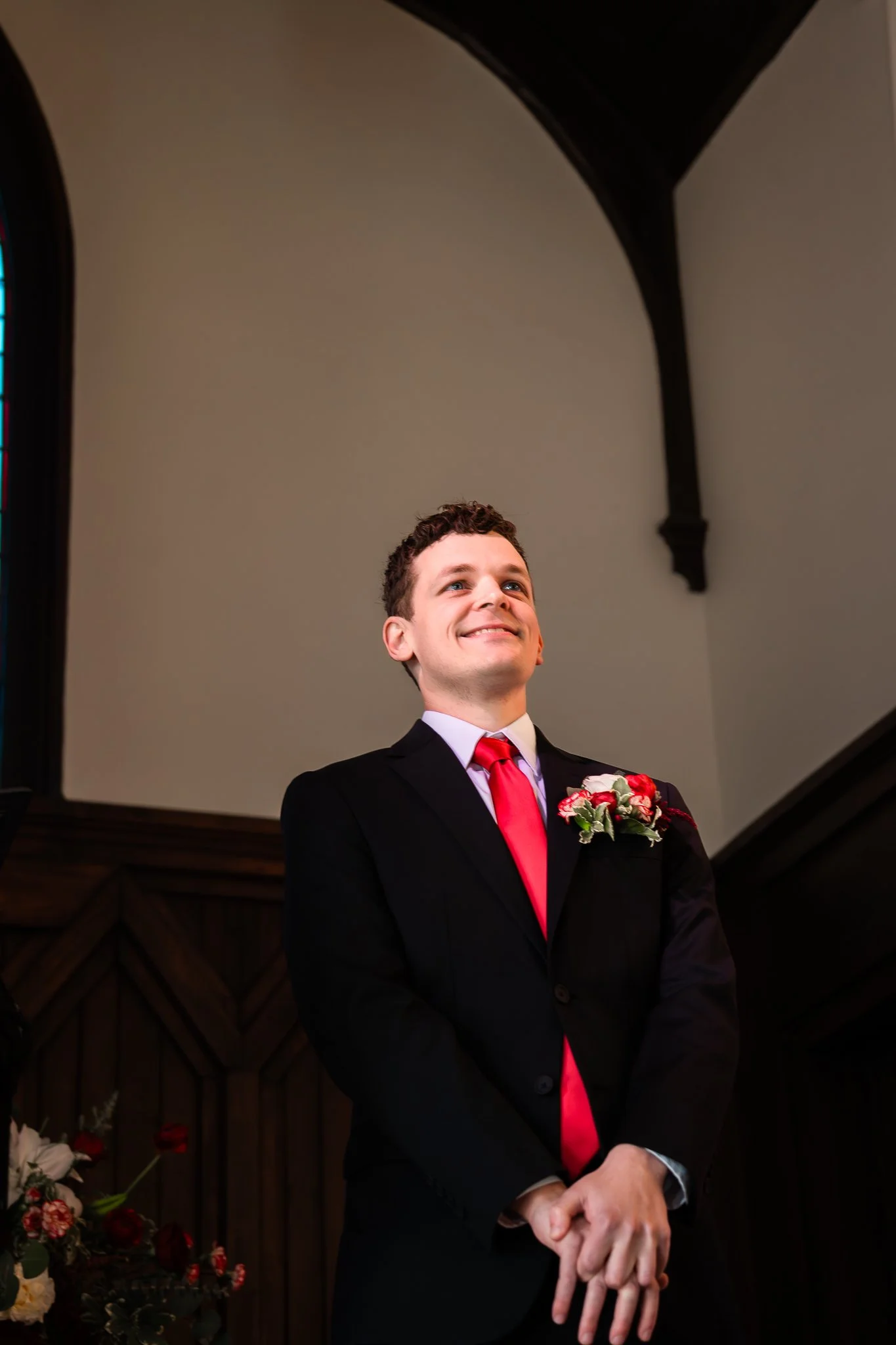all-saints-chapel-raleigh-nc-wedding-groom-candid.jpg