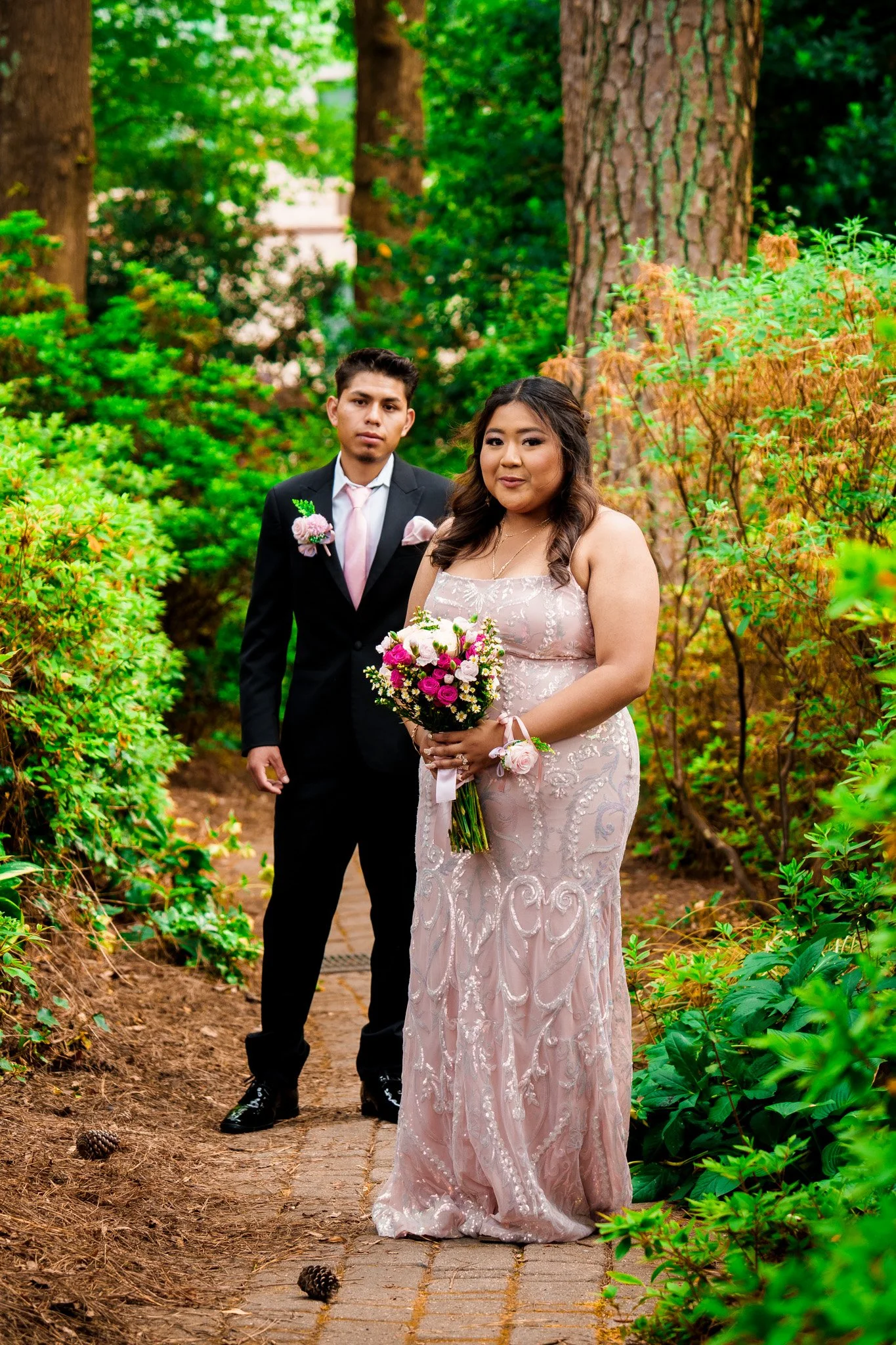 wral-azalea-gardens-raleigh-nc-prom-photography-couple-standing-pathway-kzk-visuals.jpg