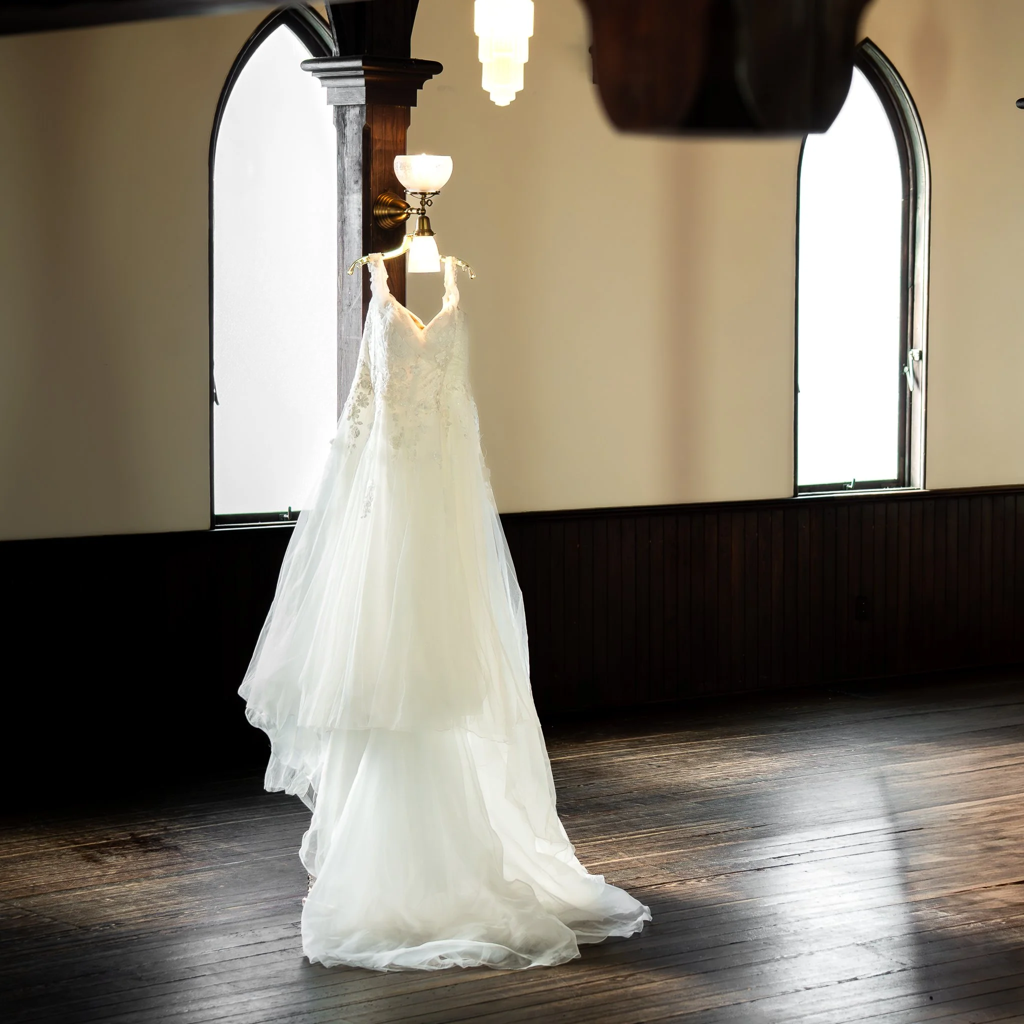 all-saints-chapel-raleigh-nc-wedding-dress-hanging.jpg
