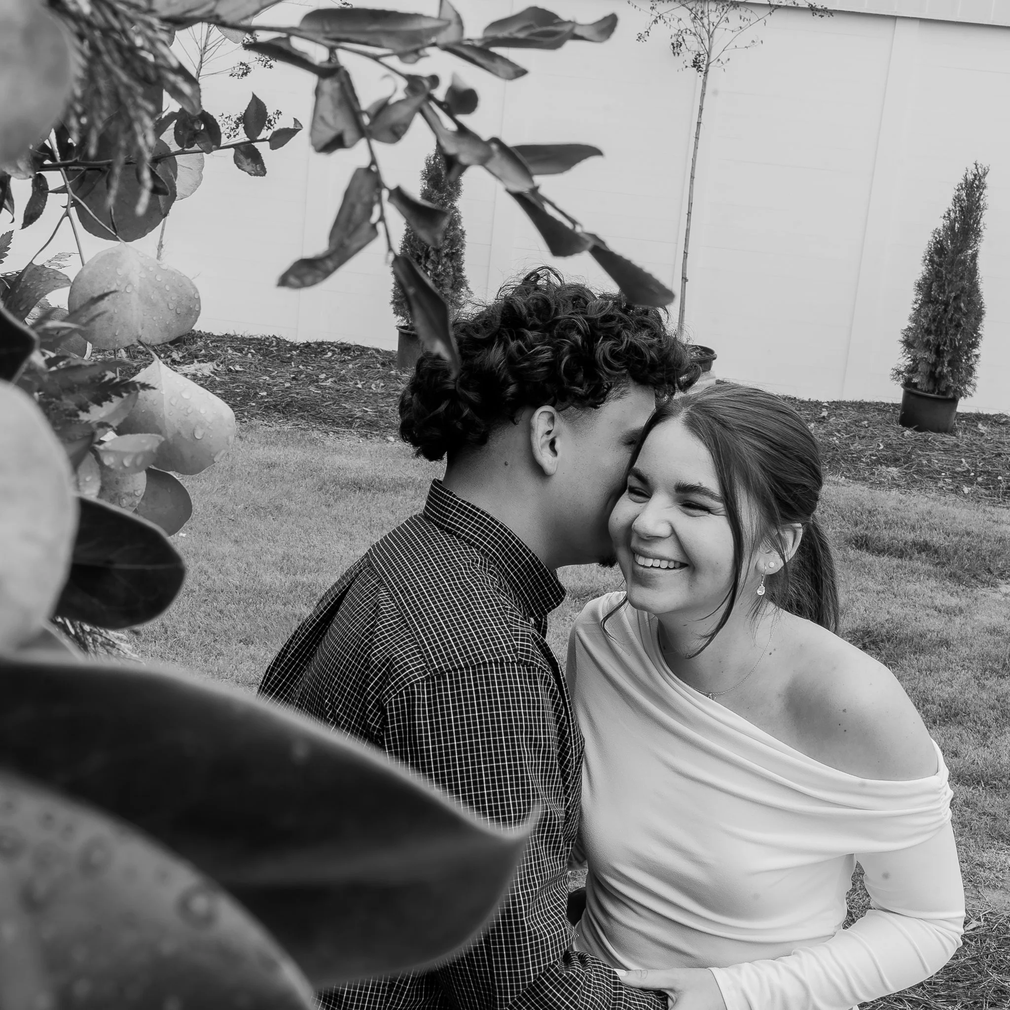 hartwood-wedding-venue-selma-nc-engagement-session-black-and-white-candid.jpg