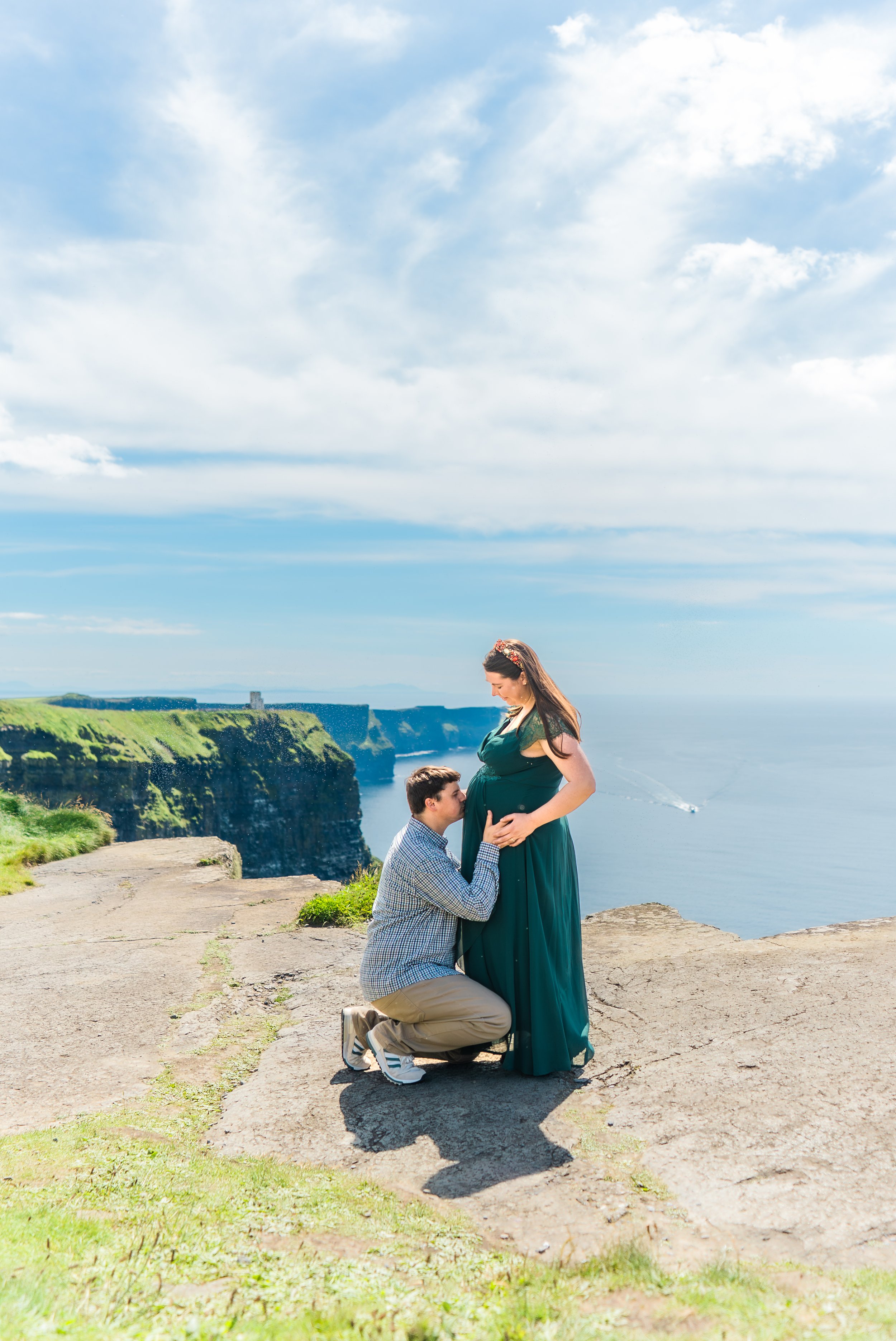 cliffs-of-moher-county-clare-ireland-maternity-session-kneeling-kiss.jpg