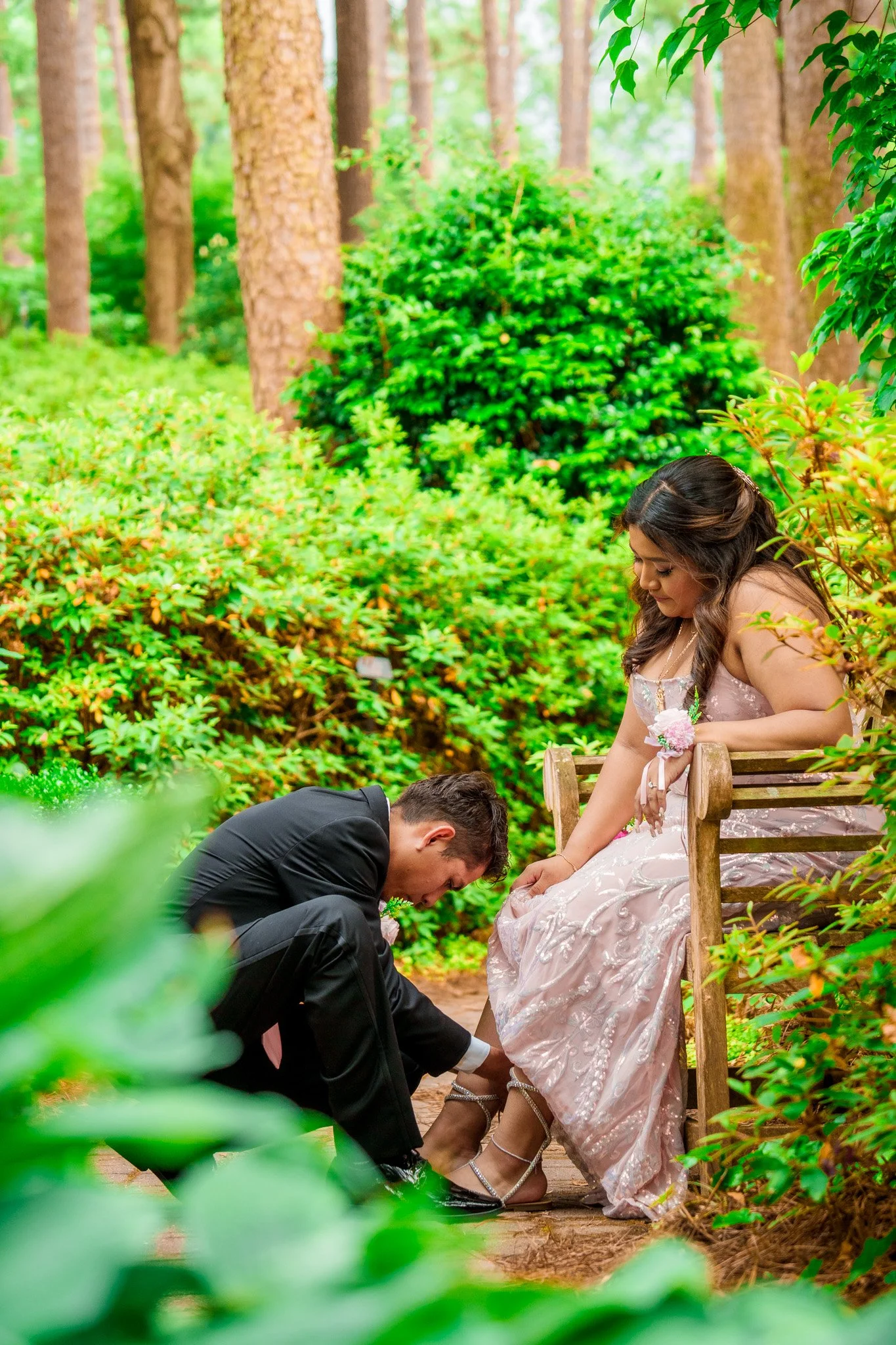 wral-azalea-gardens-raleigh-nc-prom-photography-candid-shoe-adjustment-kzk-visuals.jpg