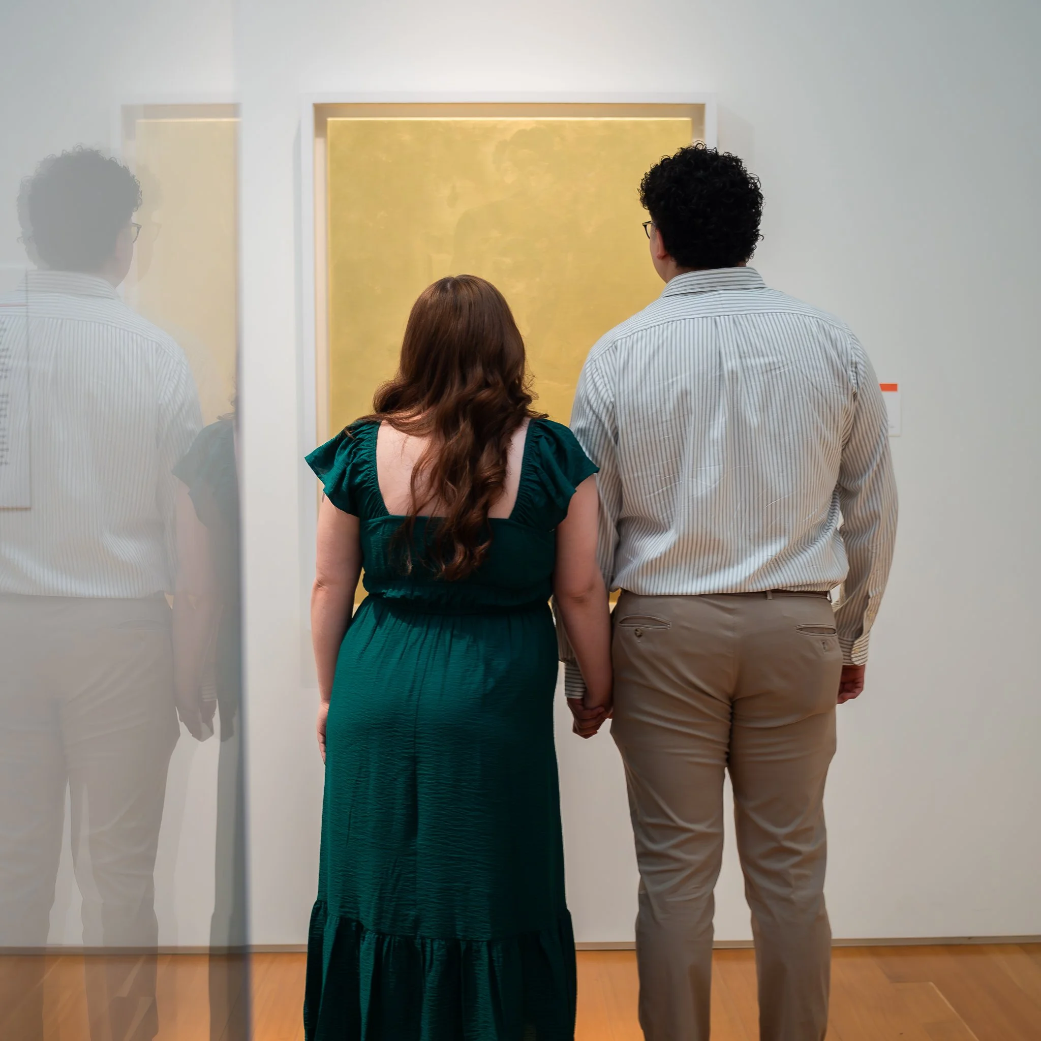 nc-museum-of-art-raleigh-nc-engagement-session-looking-at-artwork.jpg