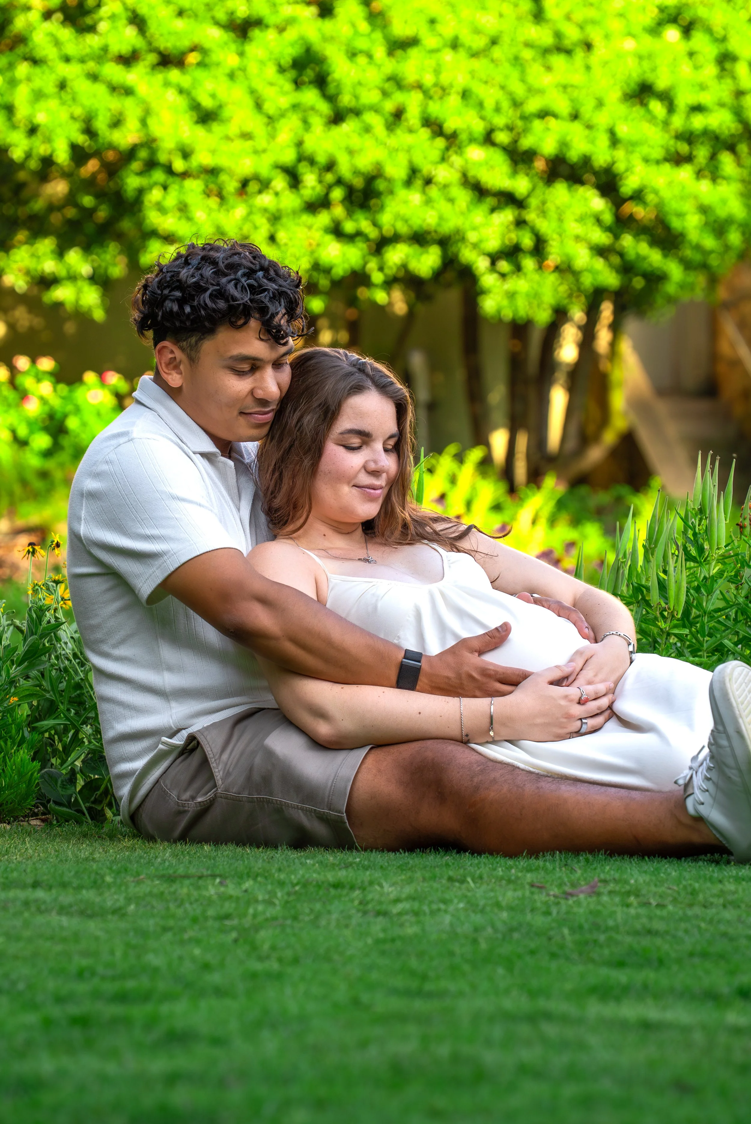 raleigh-rose-garden-raleigh-nc-maternity-session-relaxed-embrace.jpg