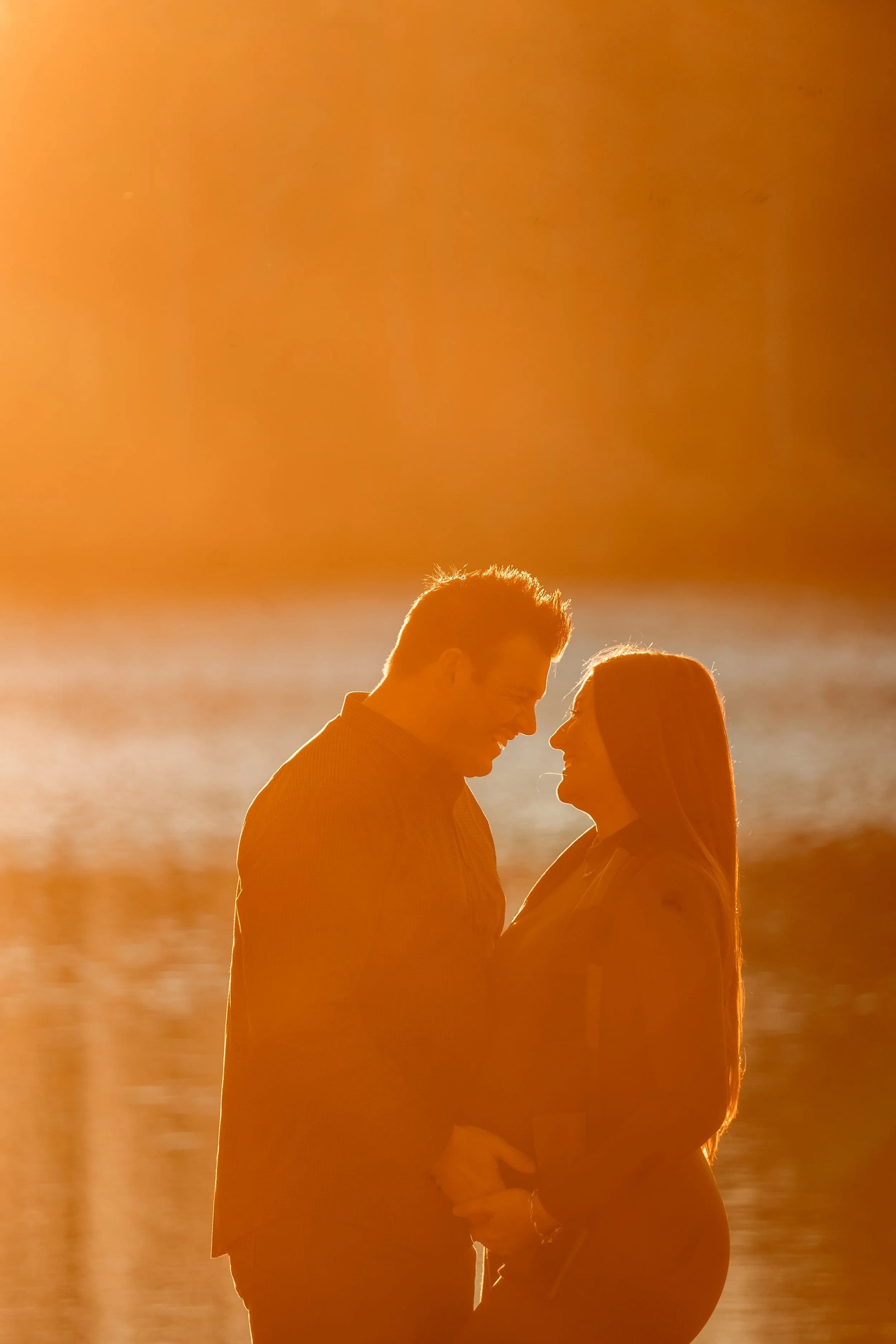north-carolina-maternity-photographer-sunset-silhouette-couple.JPG