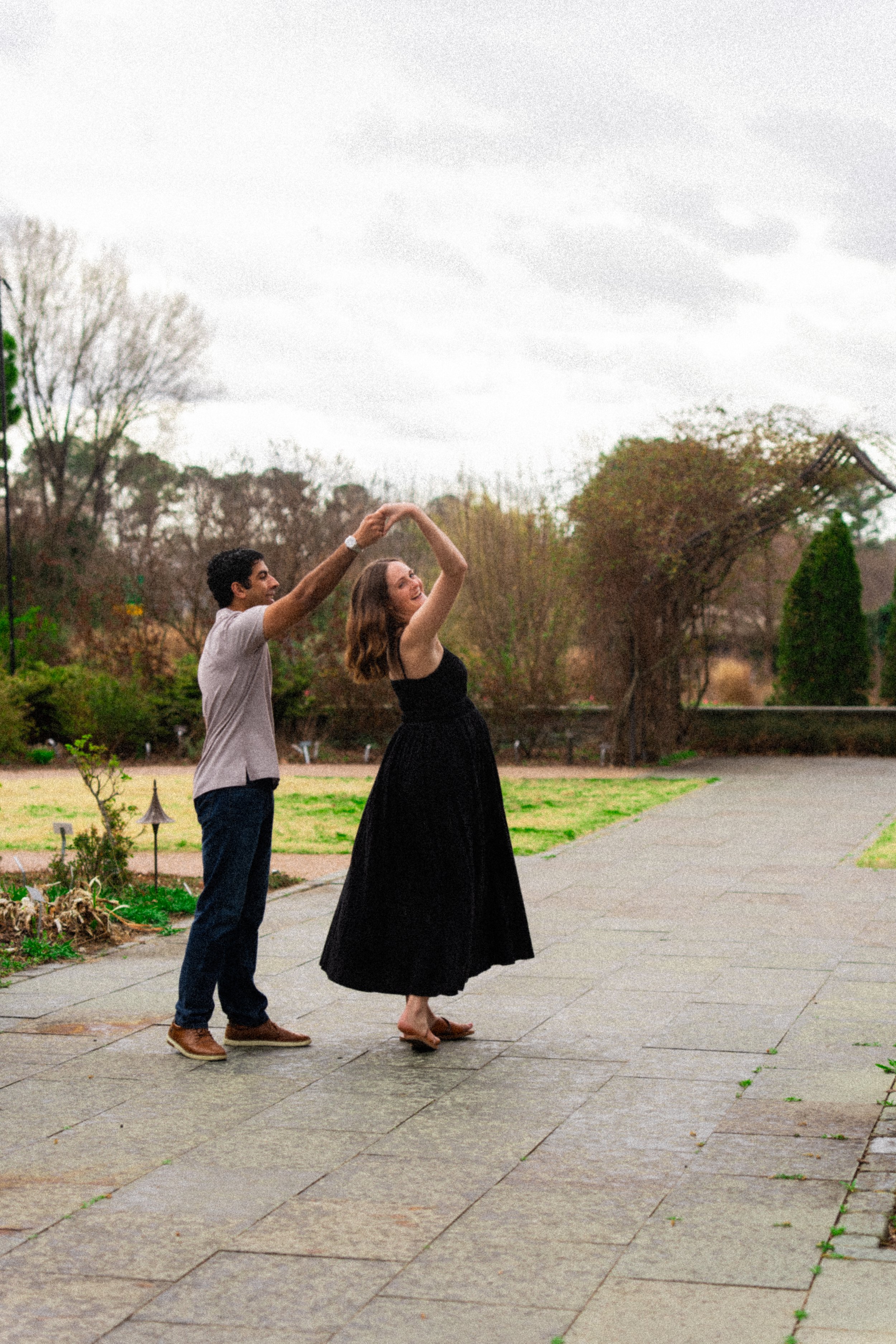 jc-raulston-arboretum-raleigh-nc-maternity-session-twirl.jpg