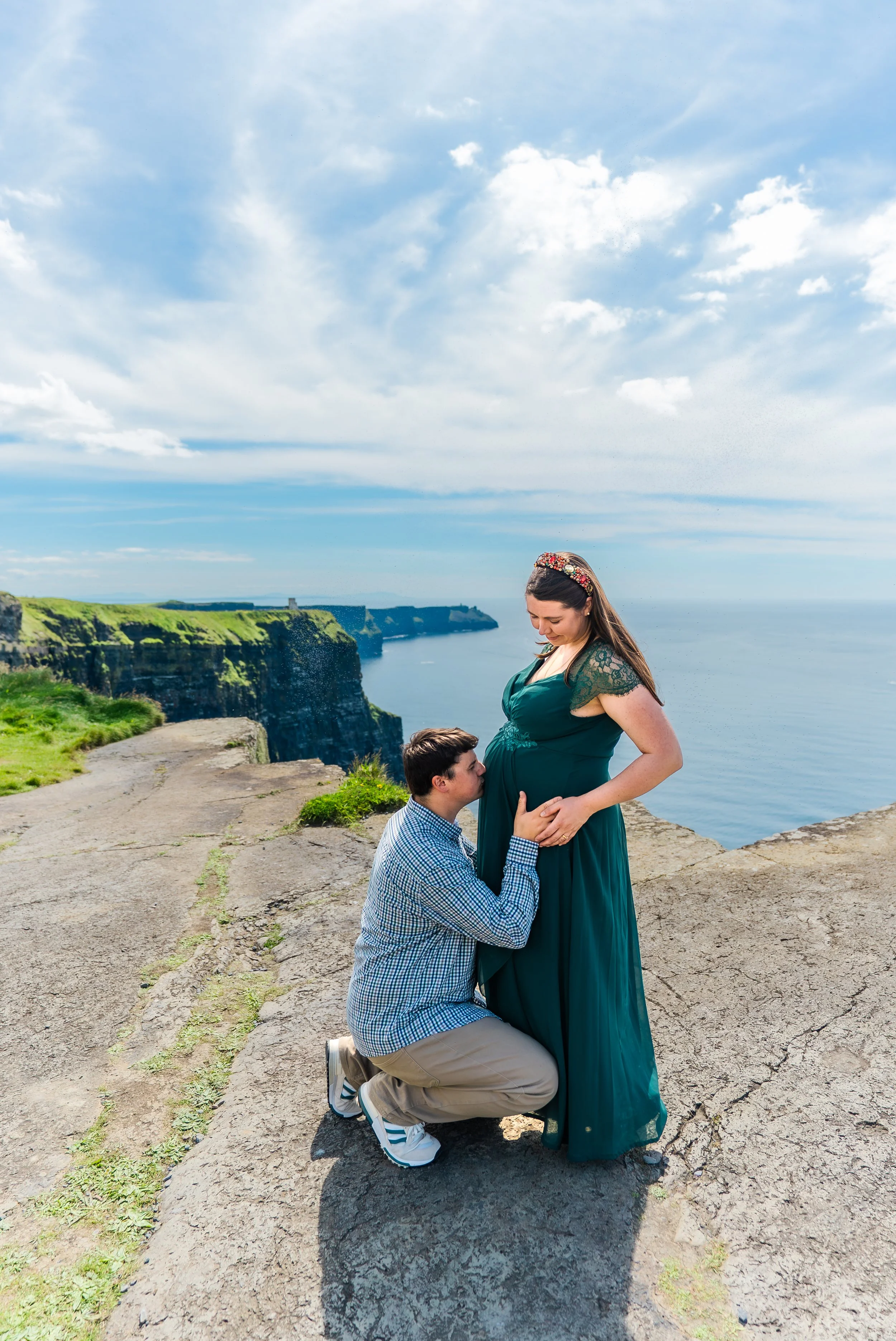 cliffs-of-moher-county-clare-ireland-maternity-session-kneeling-baby-bump-close.jpg