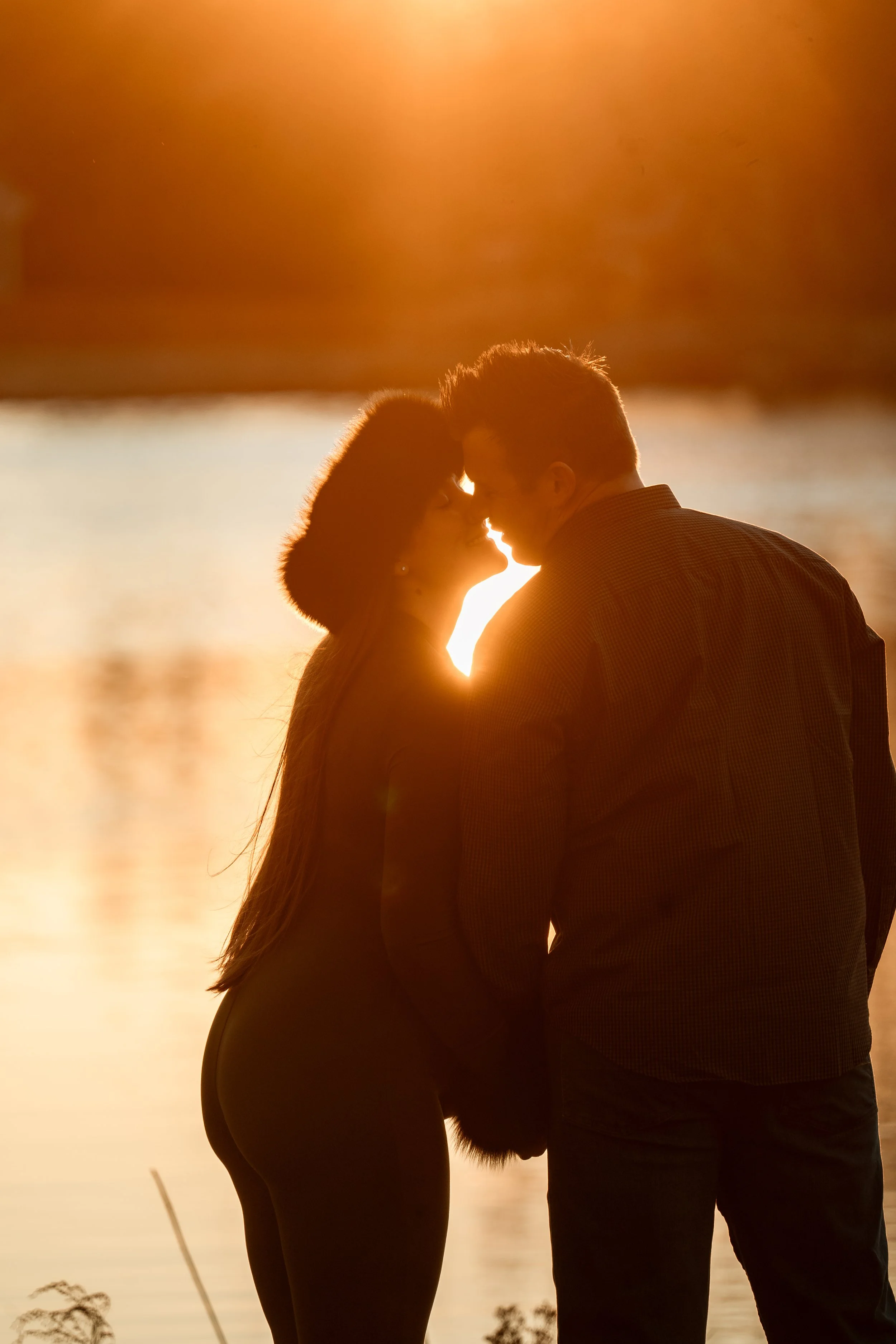 north-carolina-maternity-photographer-sunset-kiss-silhouette.JPG