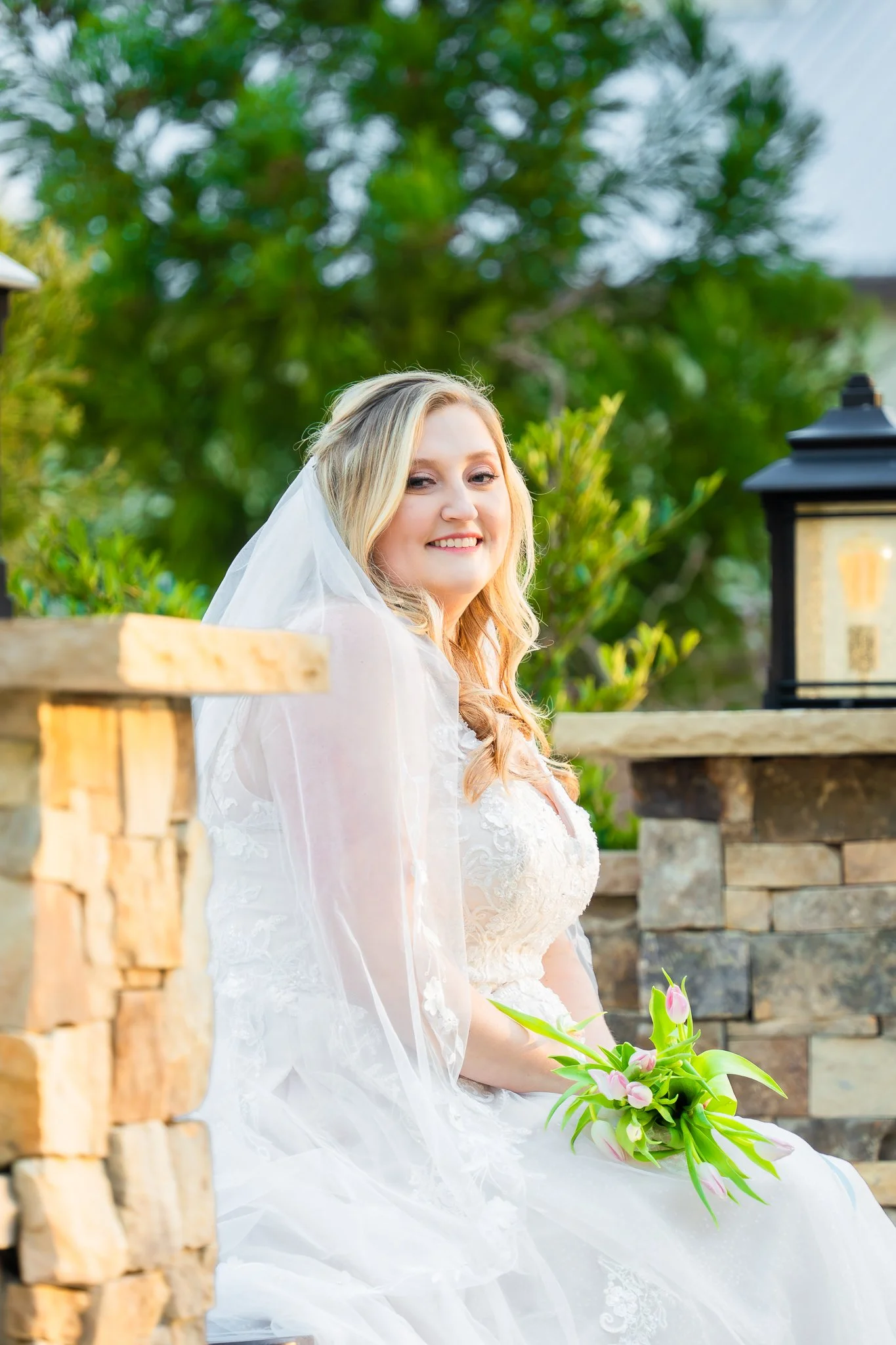 mini-acre-farms-raleigh-nc-bridal-portrait-smiling-by-stone-wall-kzk-visuals.jpg