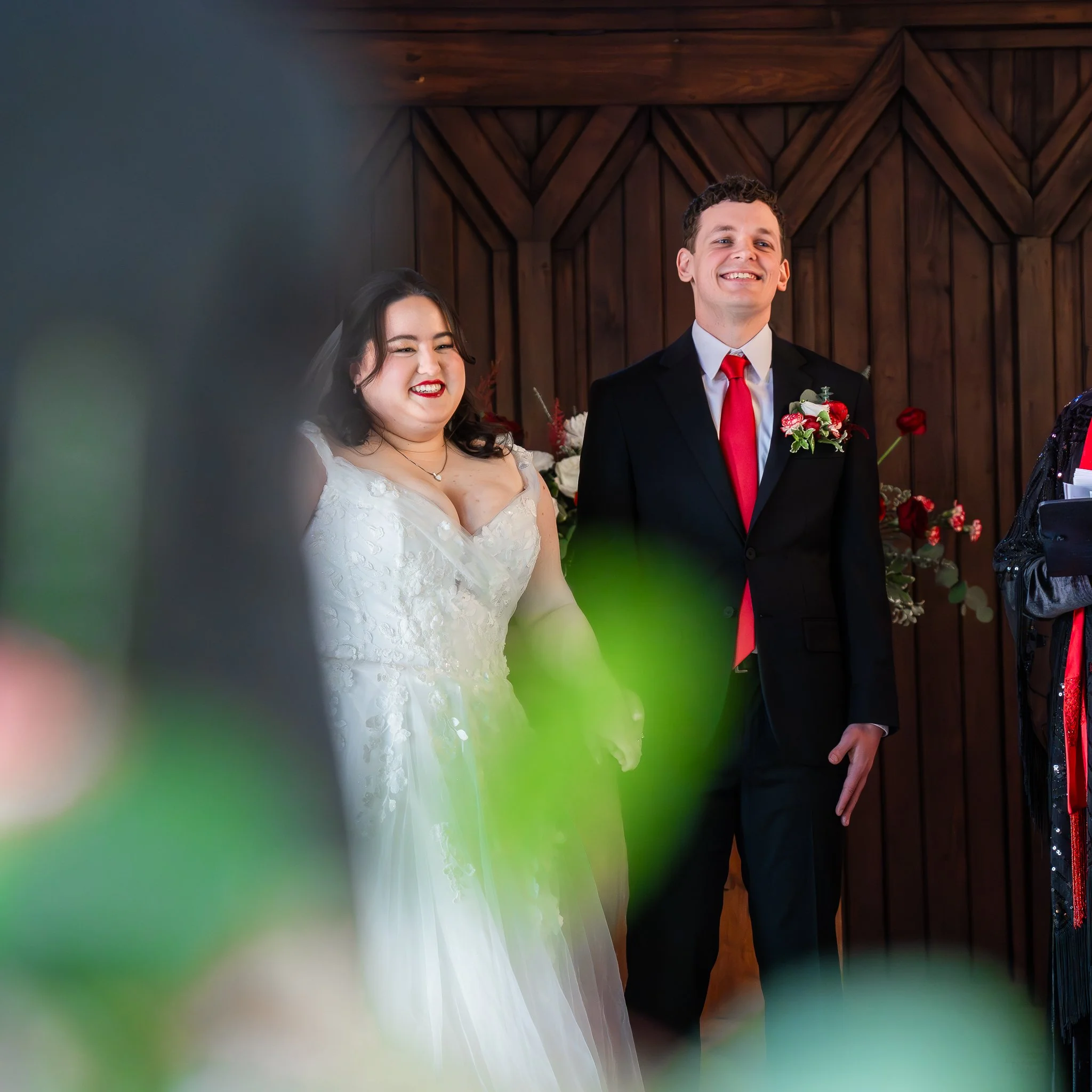 all-saints-chapel-raleigh-nc-wedding-ceremony-smile.jpg