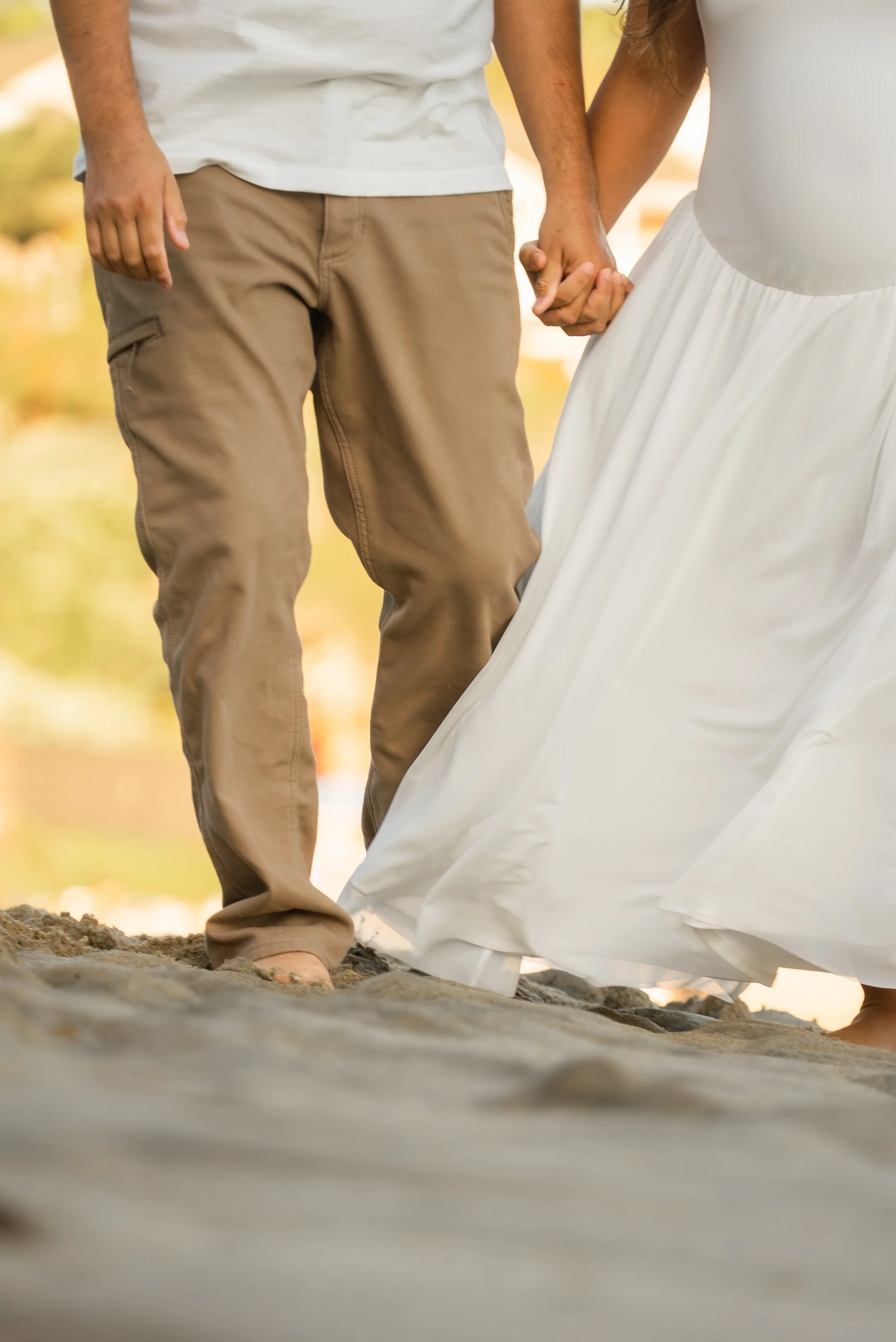 crescent-bay-beach-laguna-beach-ca-maternity-session-holding-hands-detail.jpg