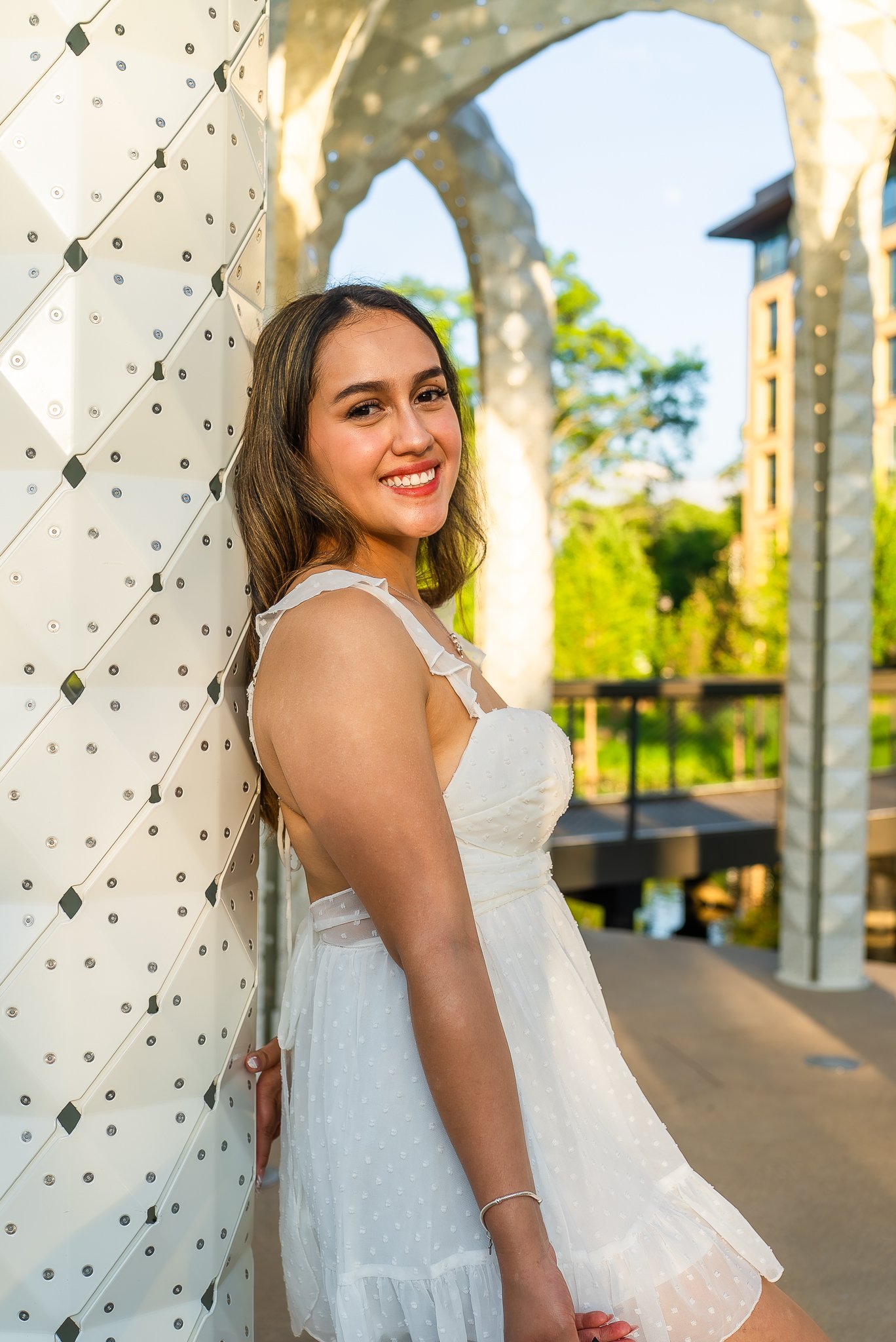 downtown-cary-park-graduation-session-white-dress-portrait.jpg