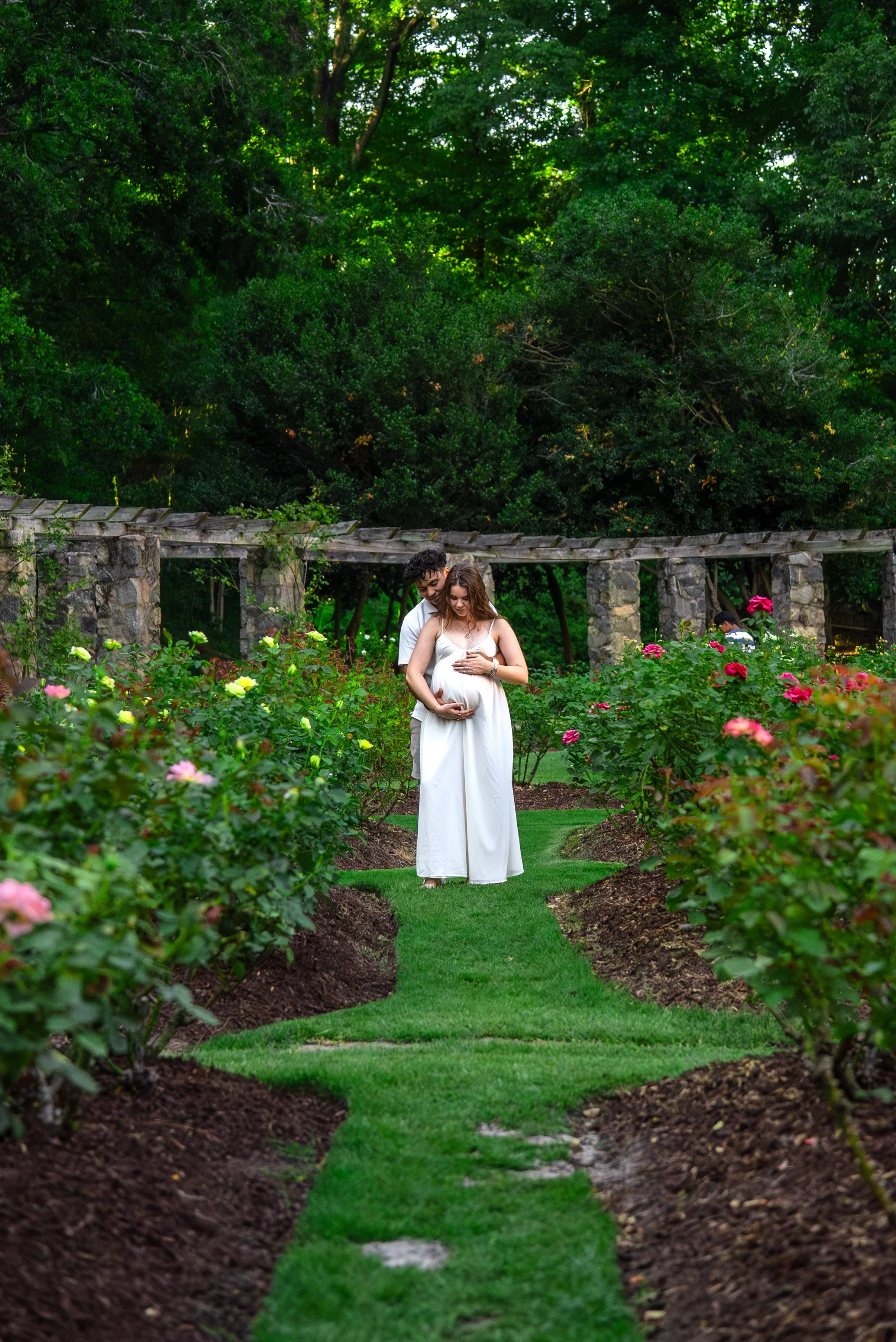 raleigh-rose-garden-raleigh-nc-maternity-session-rose-garden-walkway.jpg