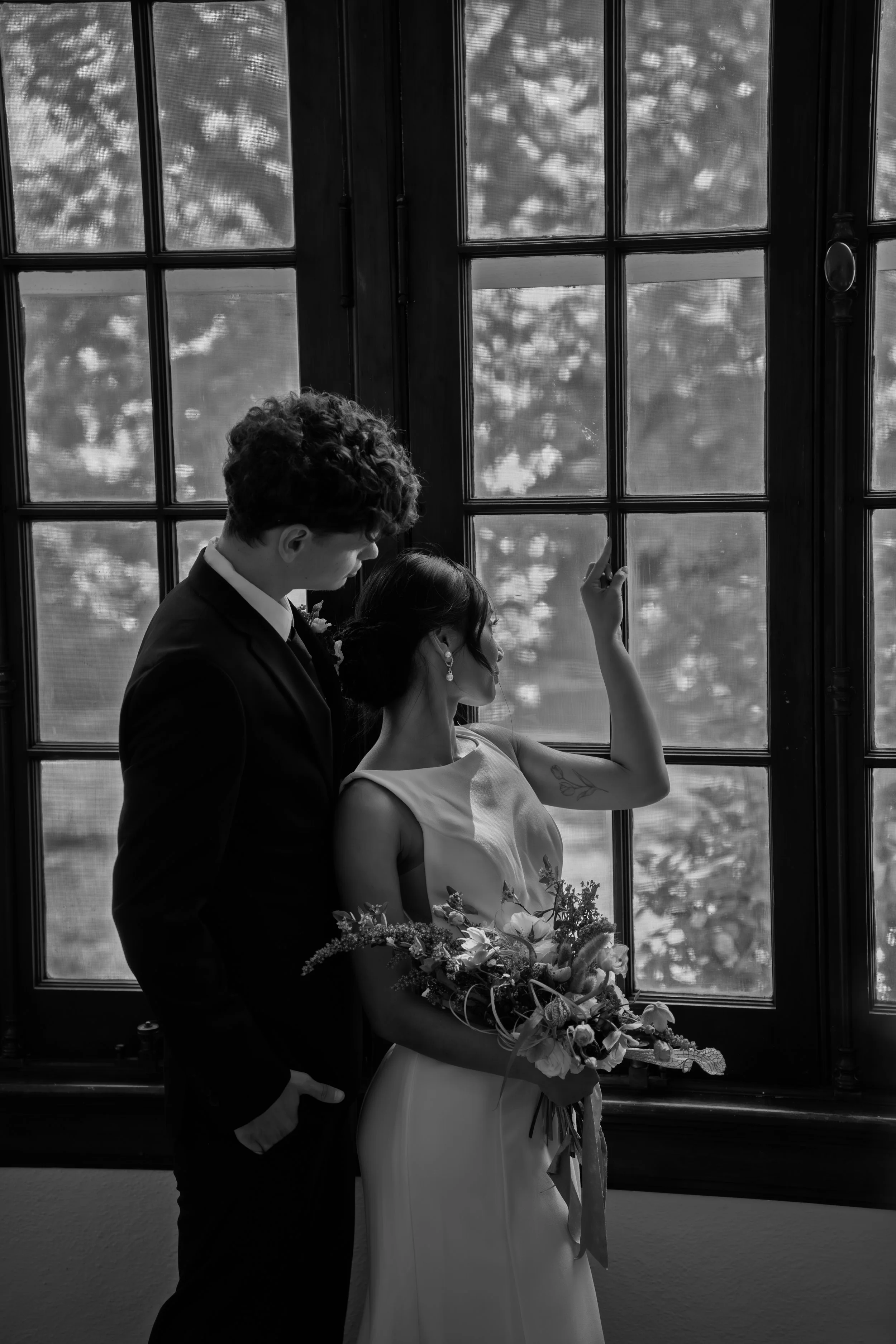 hill-house-durham-nc-wedding-black-and-white-window-portrait.jpg