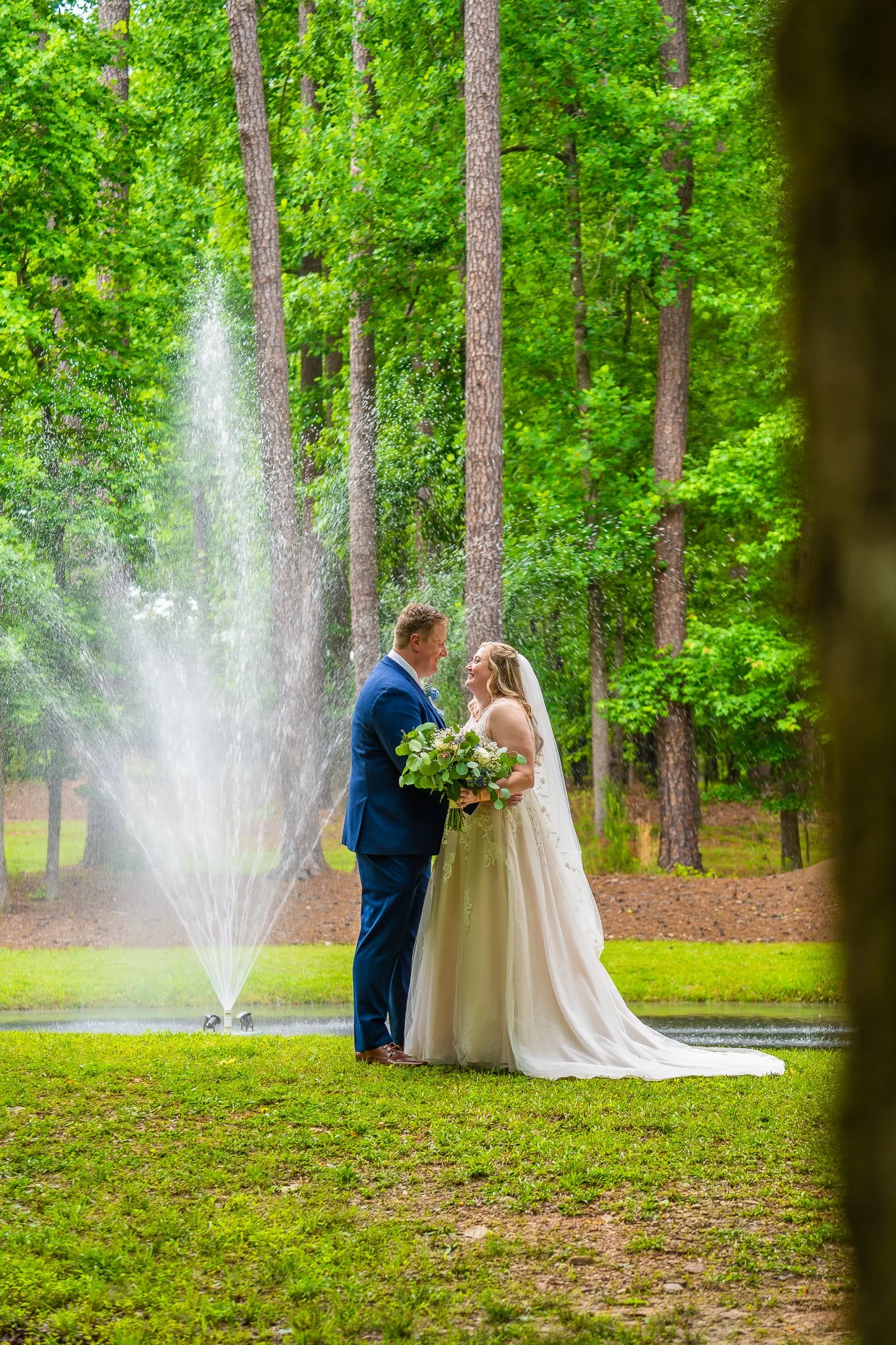 april-john-wedding-ceremony-portrait-with-fountain-mini-acre-farms-raleigh-nc.jpg