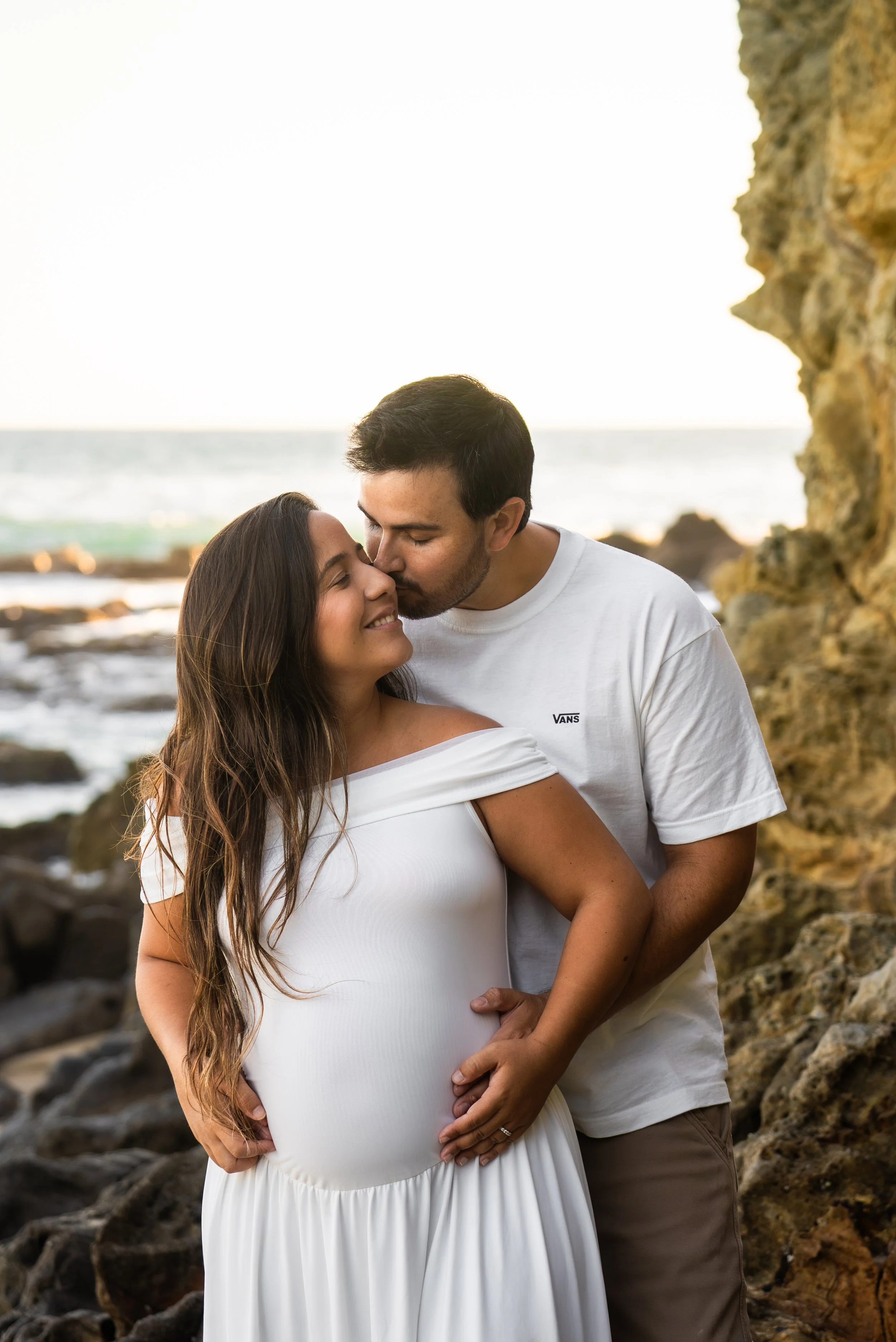 crescent-bay-beach-laguna-beach-ca-maternity-session-baby-bump-embrace.jpg