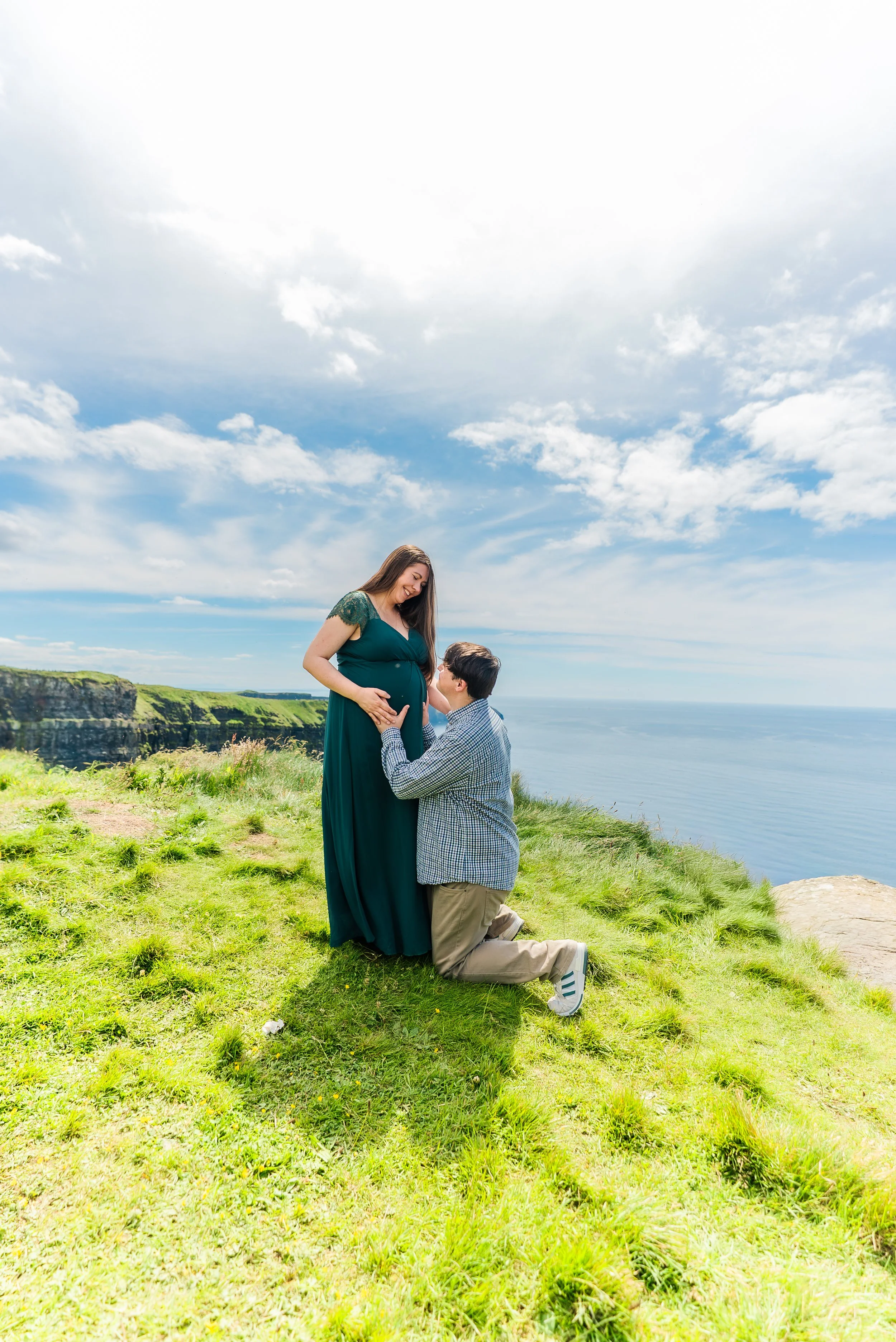 cliffs-of-moher-county-clare-ireland-maternity-session-kneeling-baby-bump.jpg