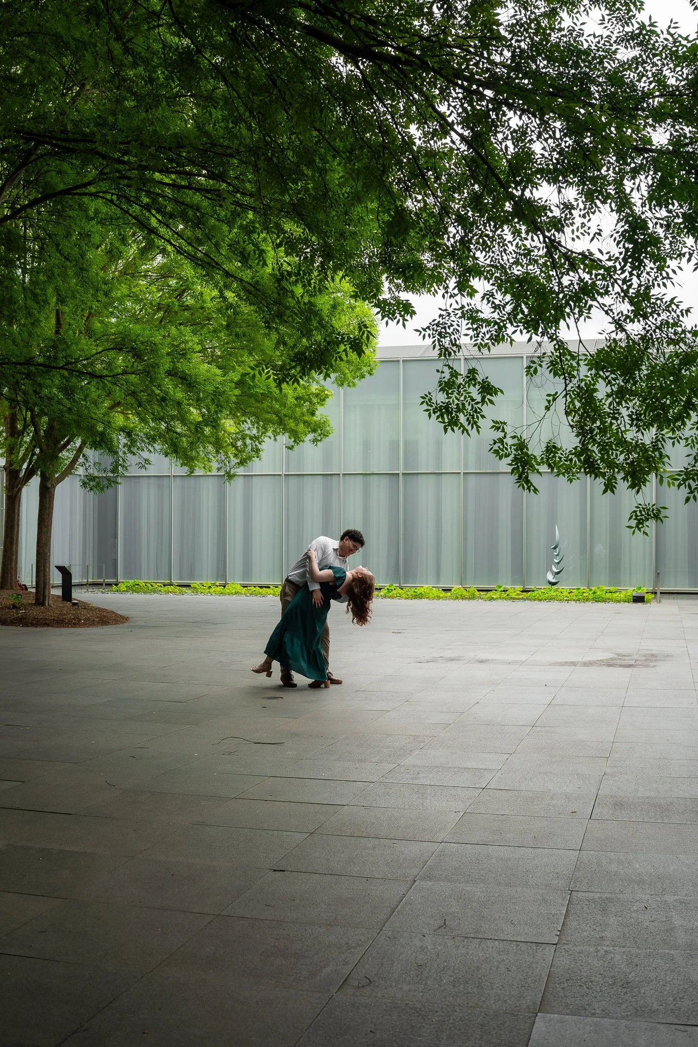 nc-museum-of-art-raleigh-nc-engagement-session-courtyard-embrace.jpg