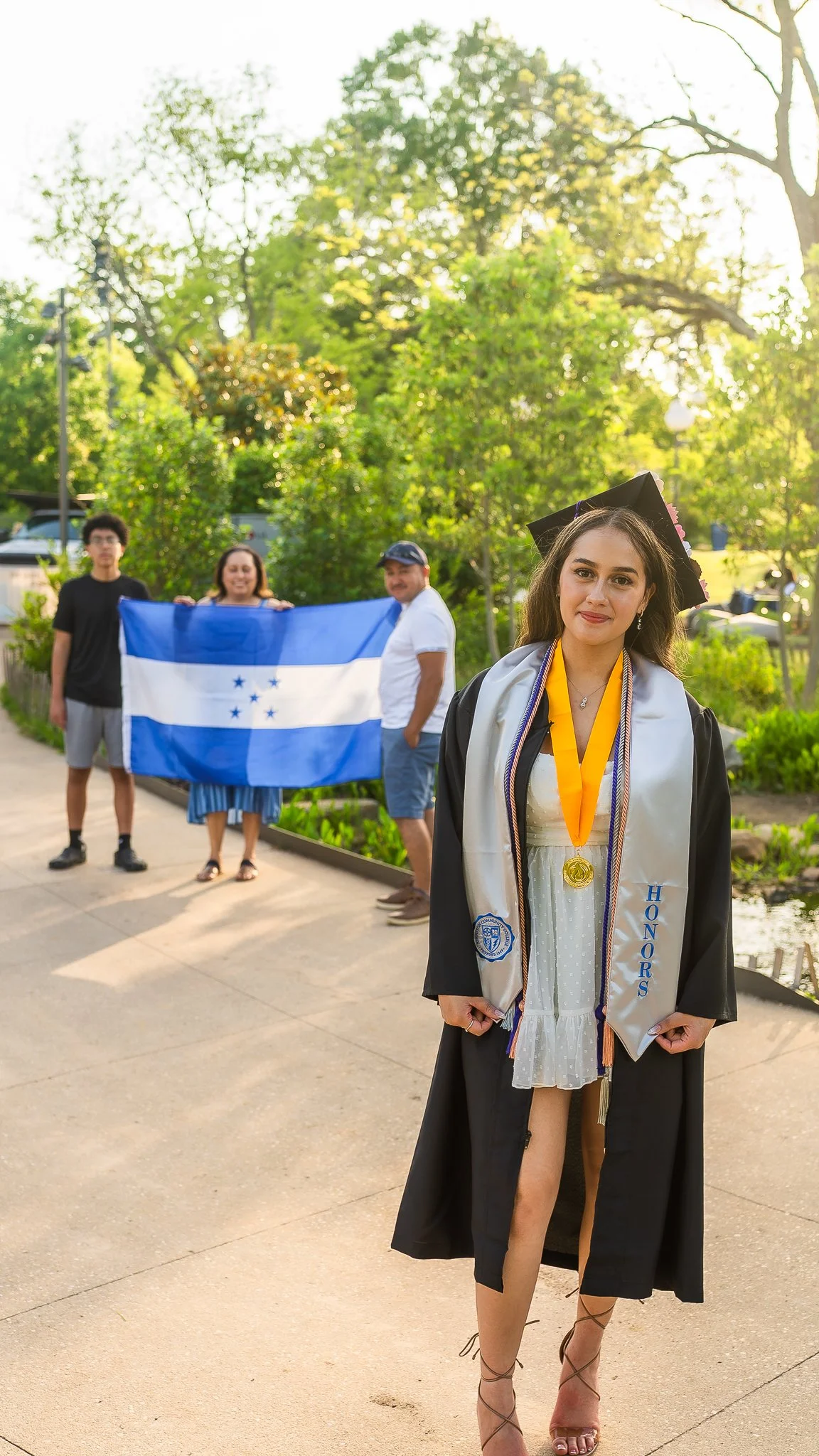 downtown-cary-park-graduation-session-family-flag-portrait-2.jpg