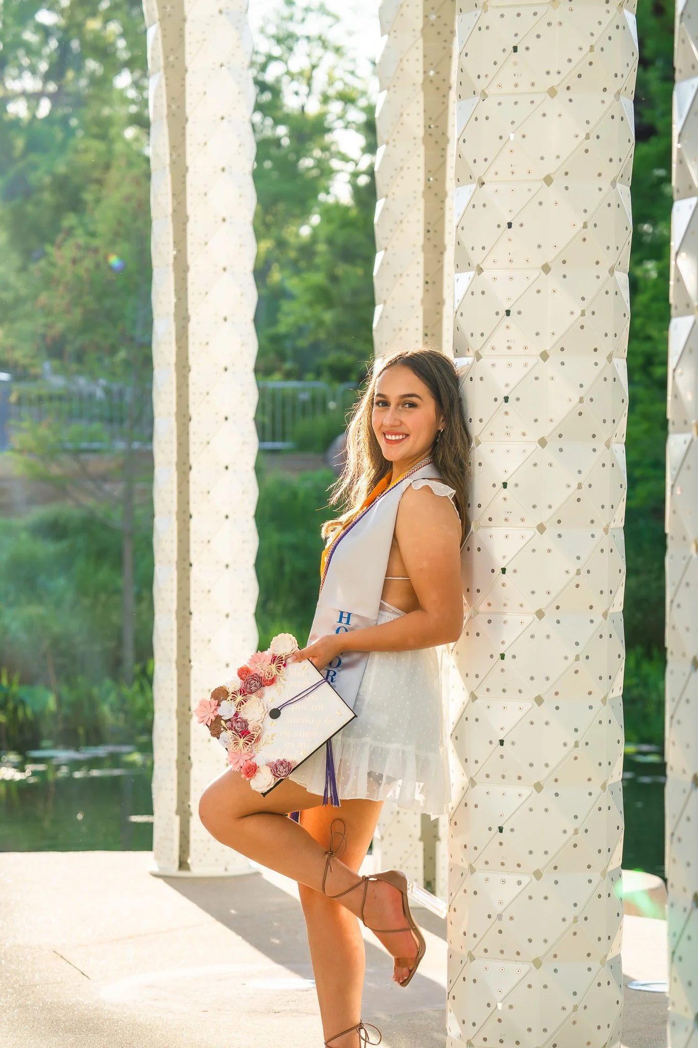 downtown-cary-park-graduation-session-column-portrait.jpg