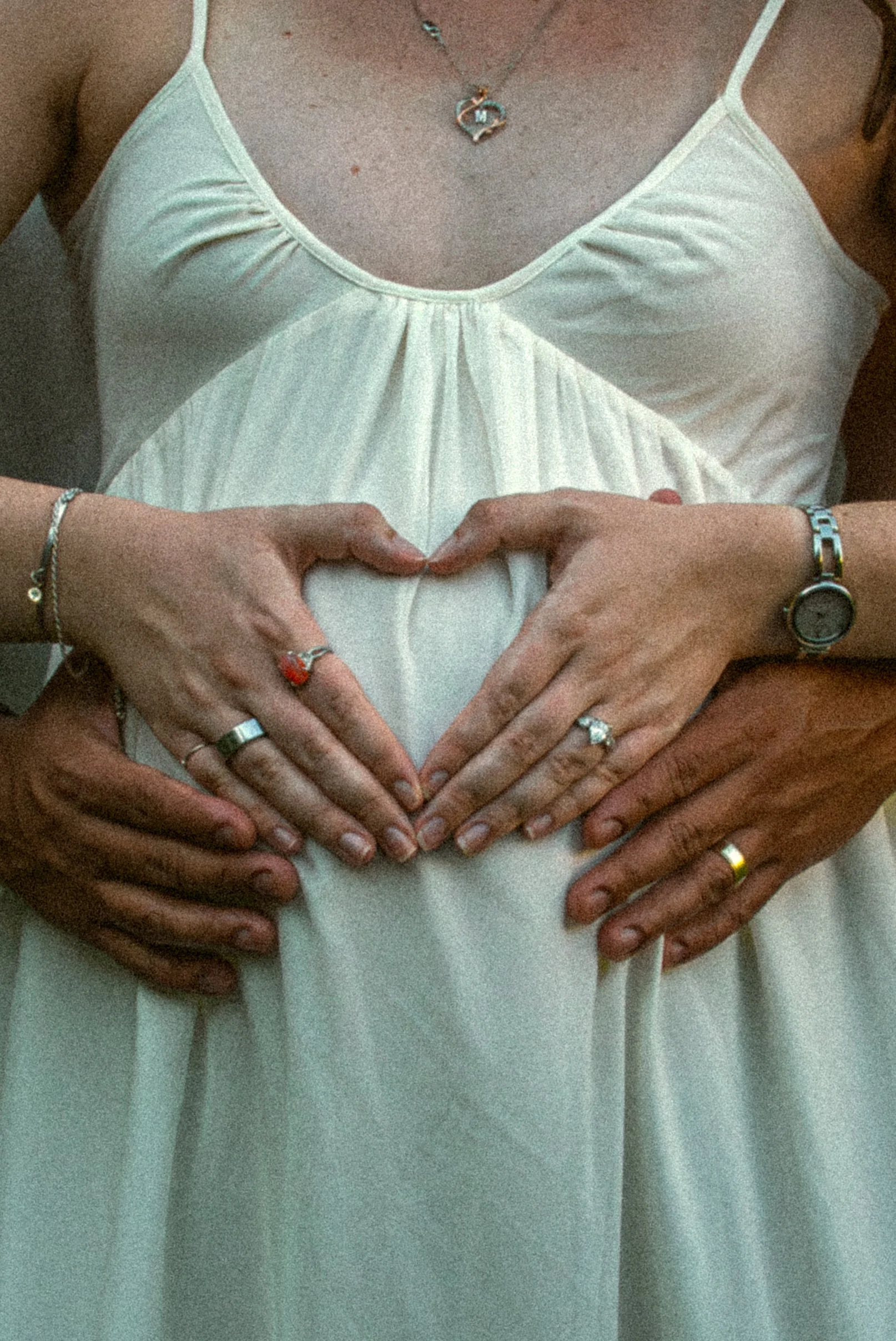 raleigh-rose-garden-raleigh-nc-maternity-session-heart-hands-detail.jpg