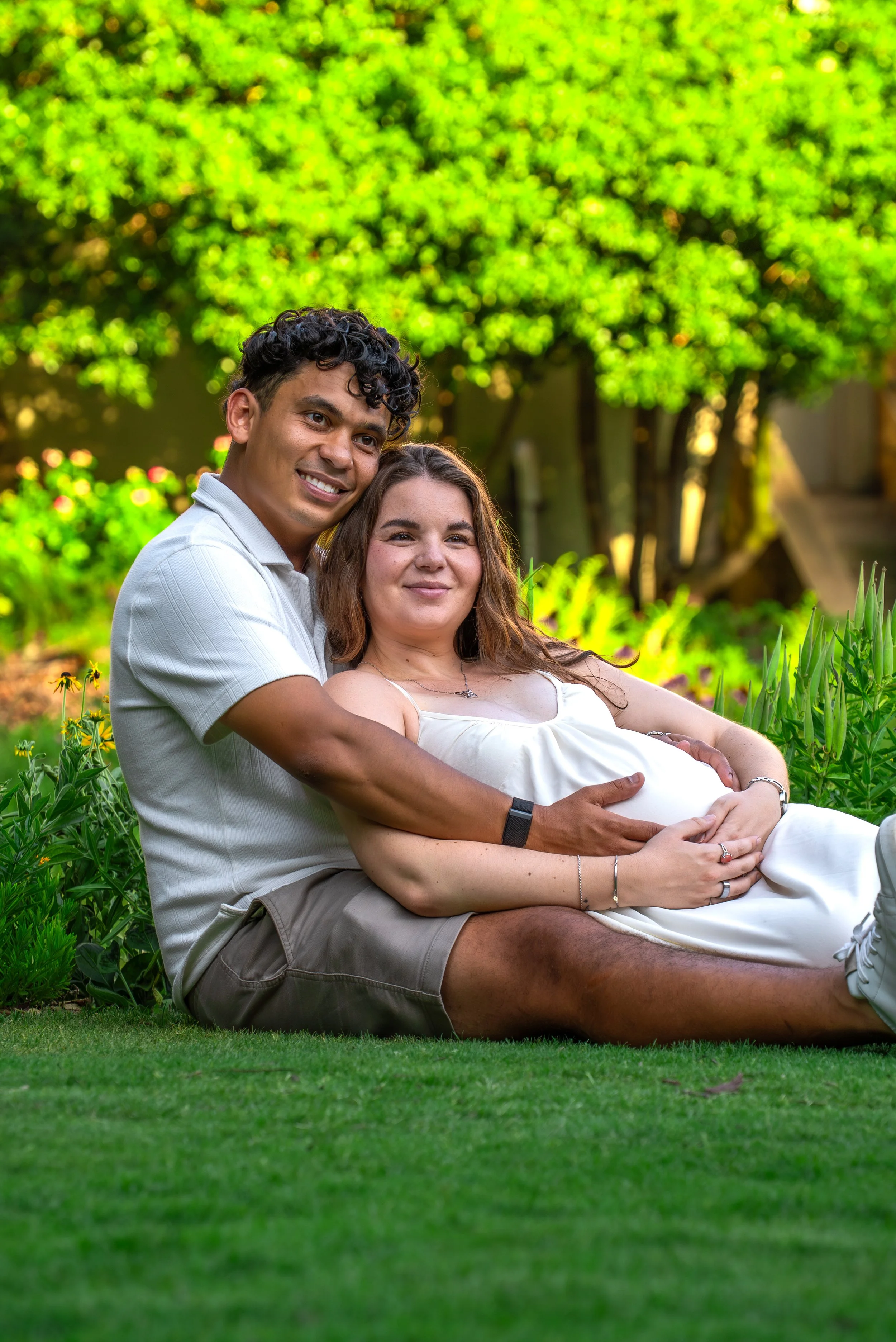 raleigh-rose-garden-raleigh-nc-maternity-session-grass-embrace.jpg