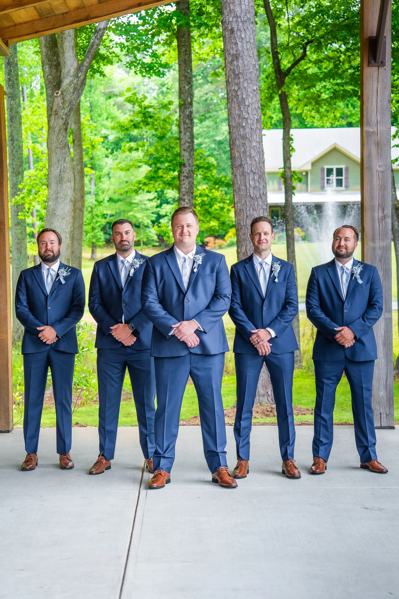 april-john-wedding-ceremony-groomsmen-lined-up-mini-acre-farms-raleigh-nc.jpg