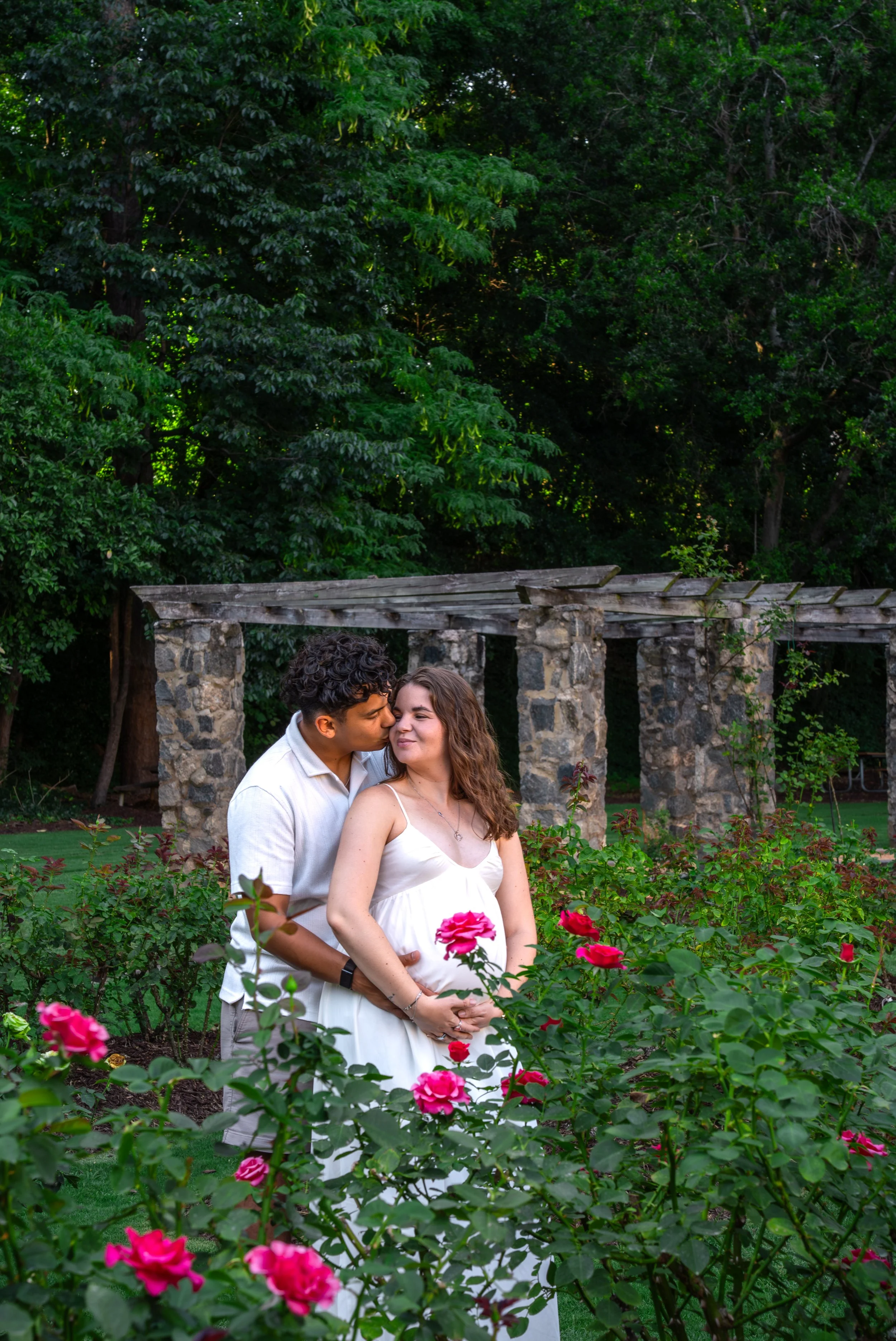raleigh-rose-garden-raleigh-nc-maternity-session-rose-garden-embrace.jpg