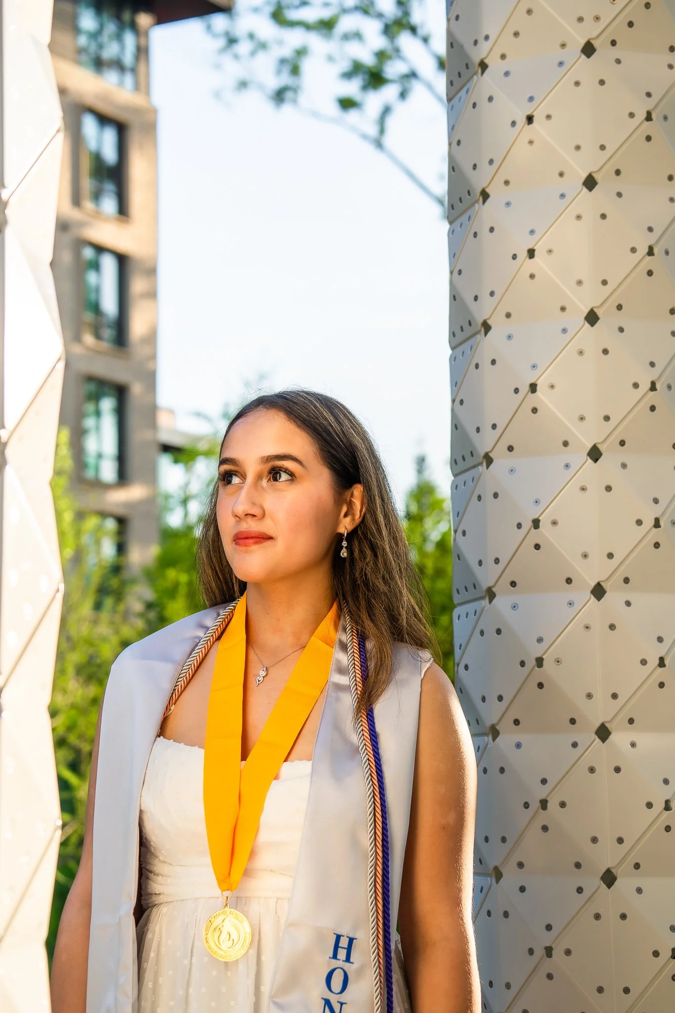 downtown-cary-park-graduation-session-medals-headshot.jpg