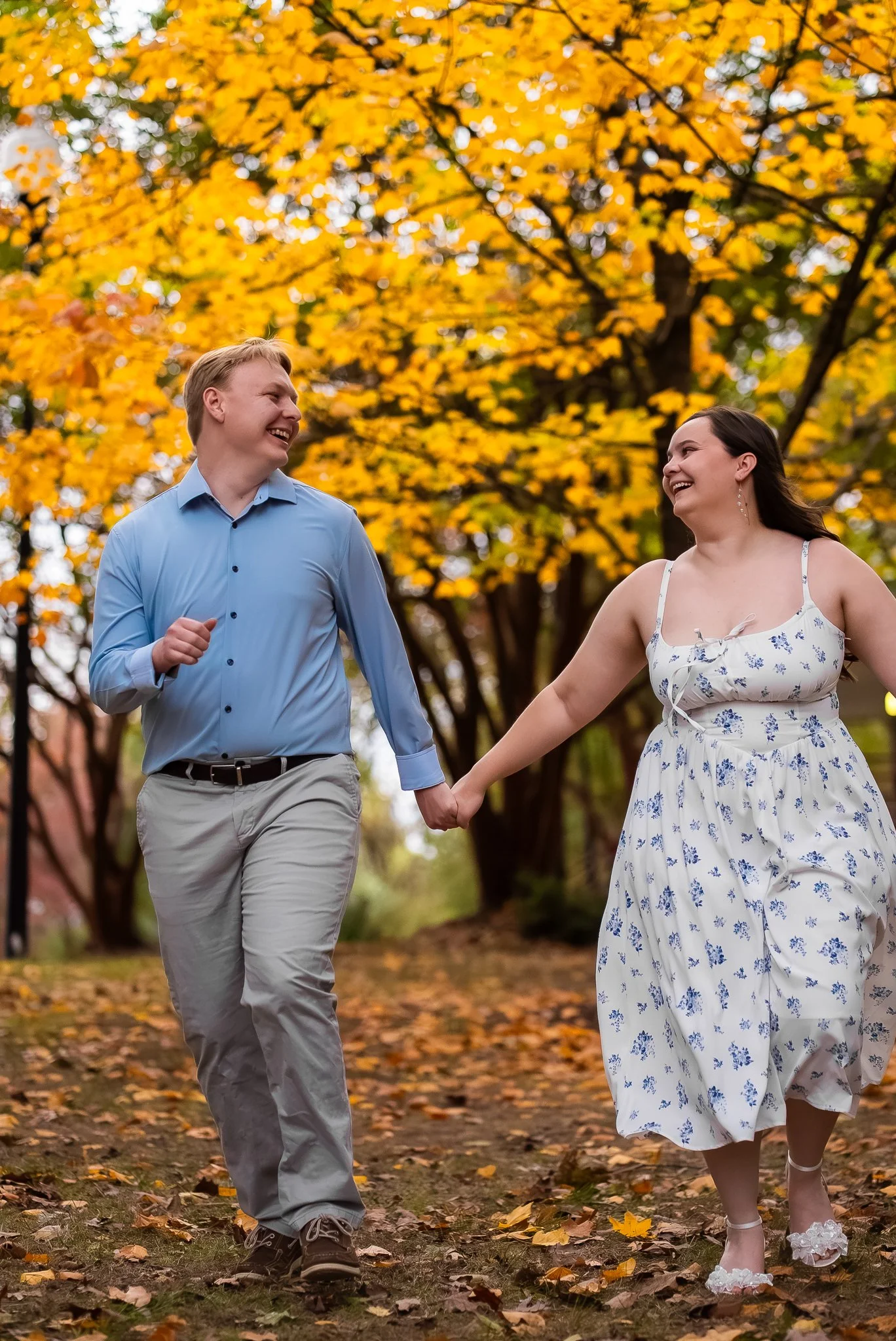 dorothea-dix-park-engagement-session-raleigh-nc-walking-hand-in-hand-kzk-visuals.jpg