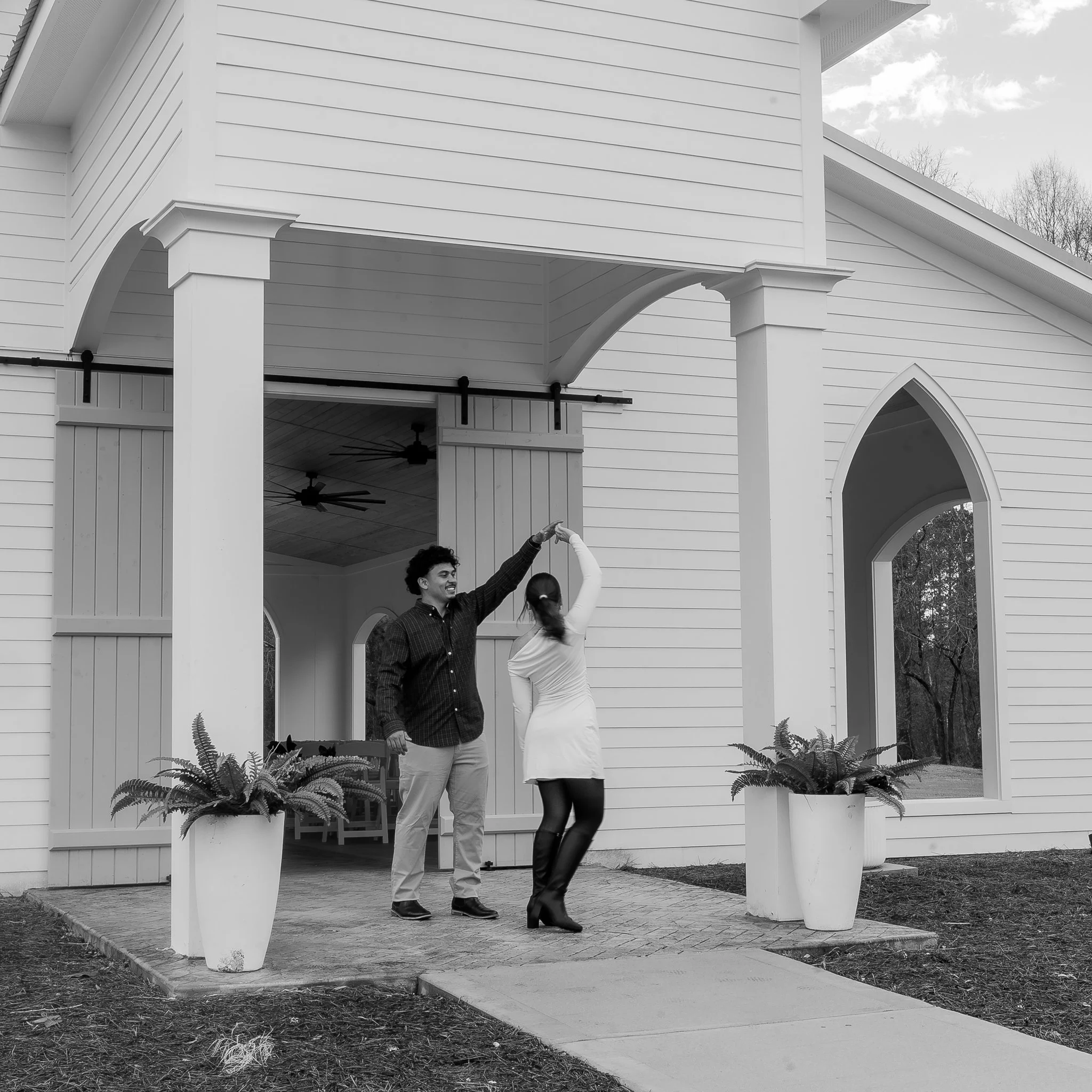hartwood-wedding-venue-selma-nc-engagement-session-black-and-white-twirl.jpg