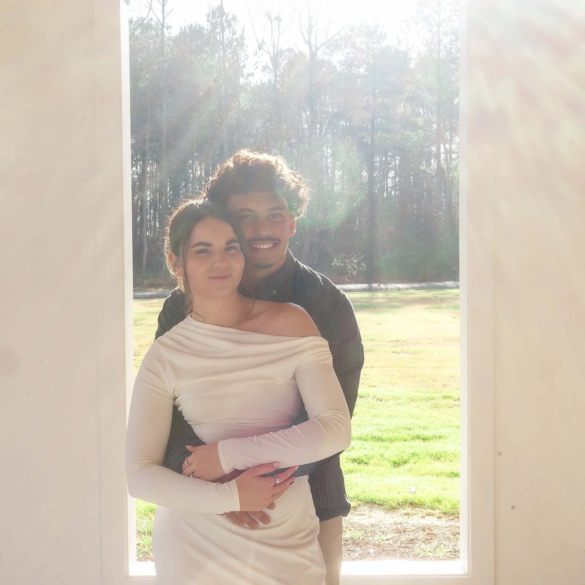 hartwood-wedding-venue-selma-nc-engagement-session-backlit-portrait.jpg